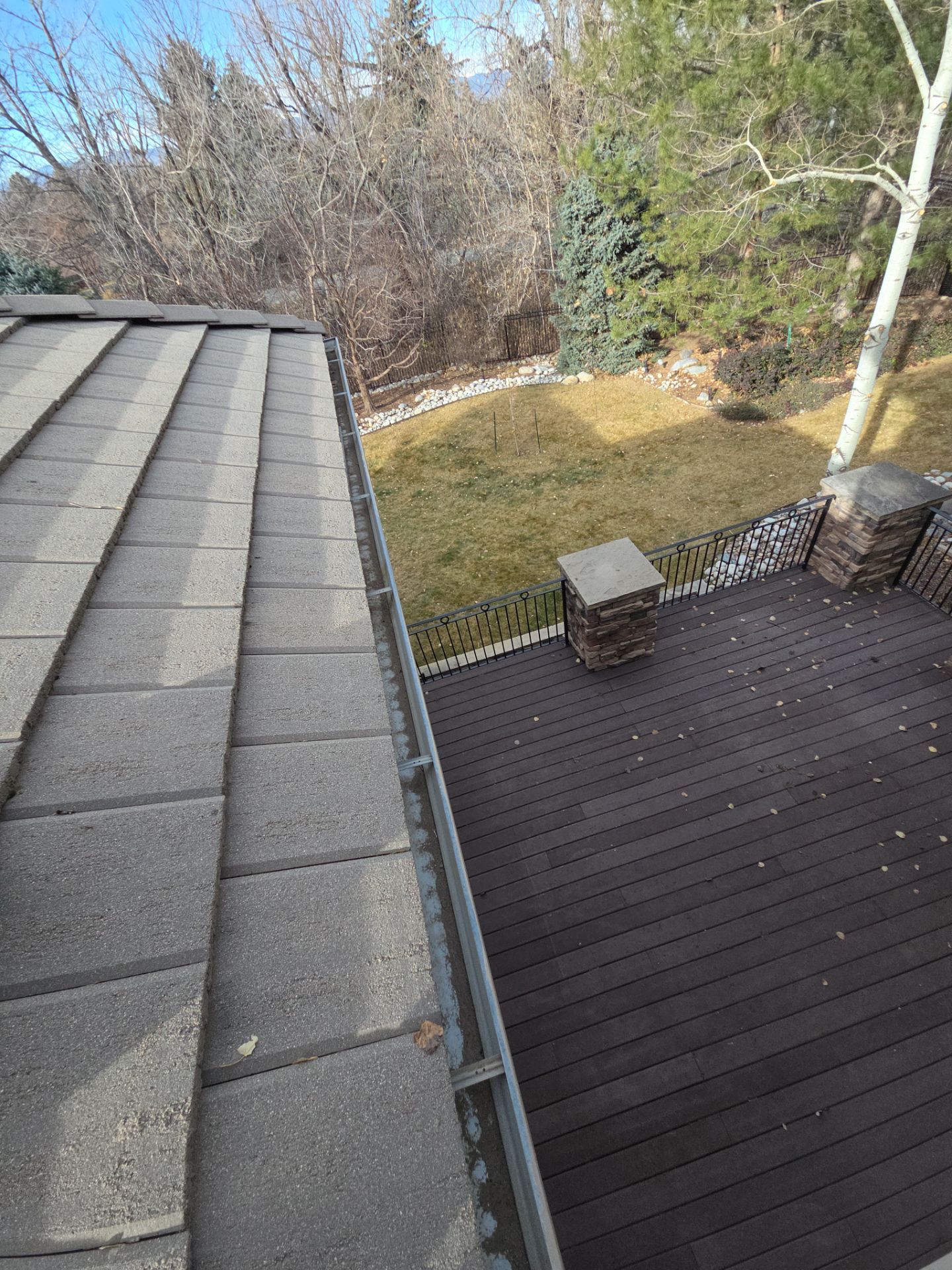 Gutters and Downspout Cleaning by RTP Roofing Company