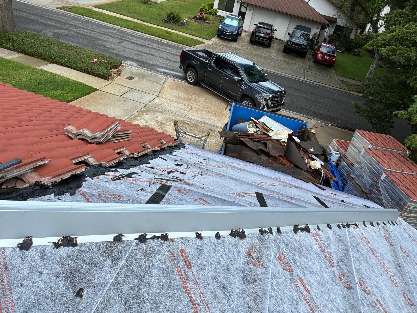 Residential Tile Roof Replacement and Gutter Installation in Winter Park by Pinnacle Roofing Group