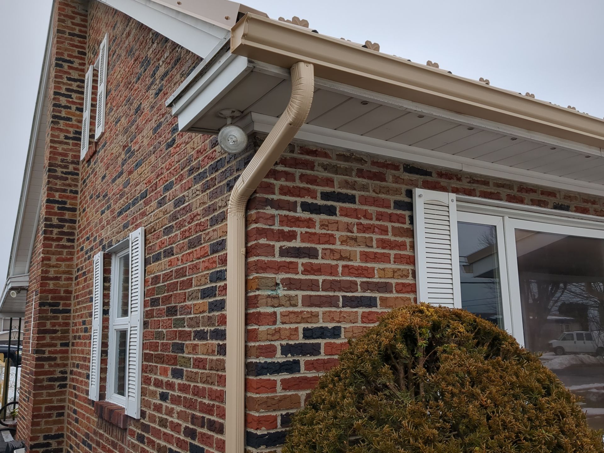 Tan Metal Roof and Gutter Replacement for Valley View Home by Esh Builders