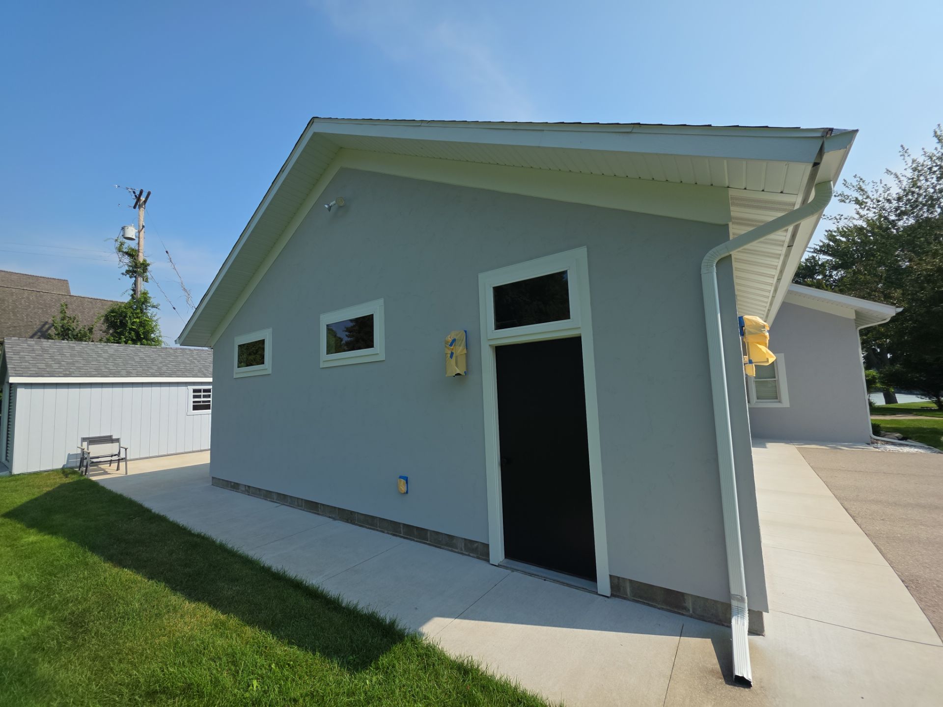 Norton Shores Residential Stucco Repair and Exterior Painting Refresh by Gordon Painting
