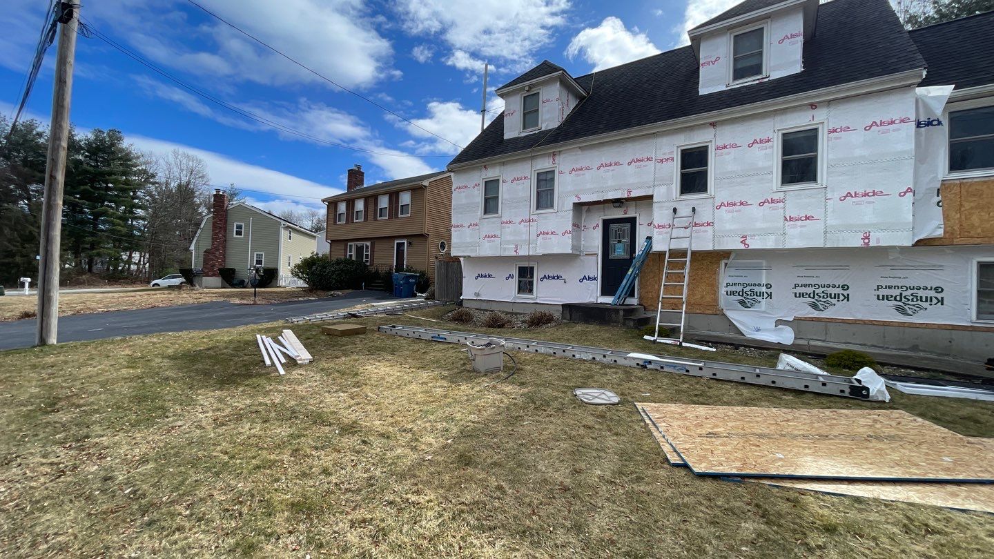 Complete Exterior Renovation with New Siding & Gutters   by Sensible Home Solutions