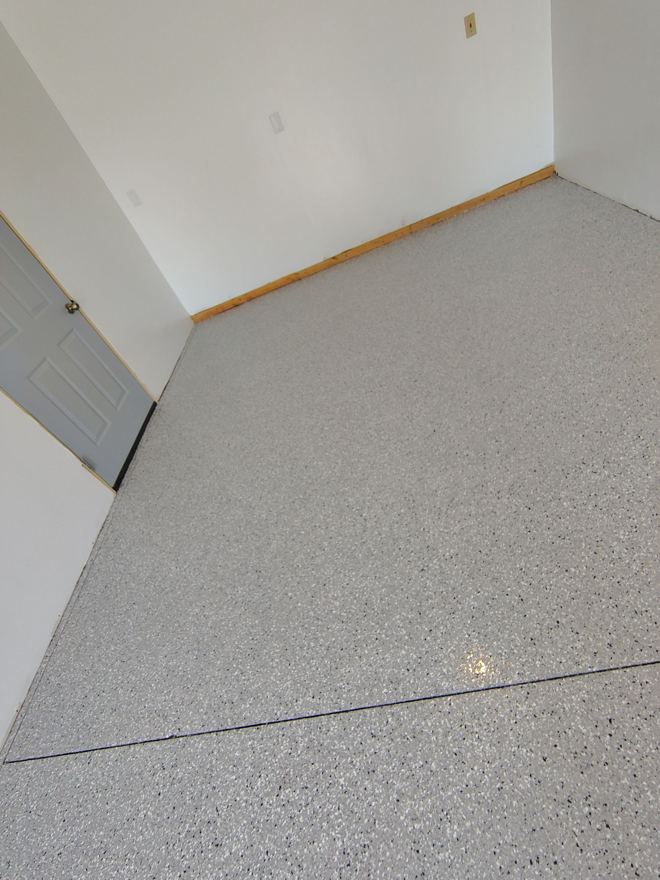 Decorative Chip Concrete Coating Installation in Luverne by Select Painting, Coatings & Garage Cabinets