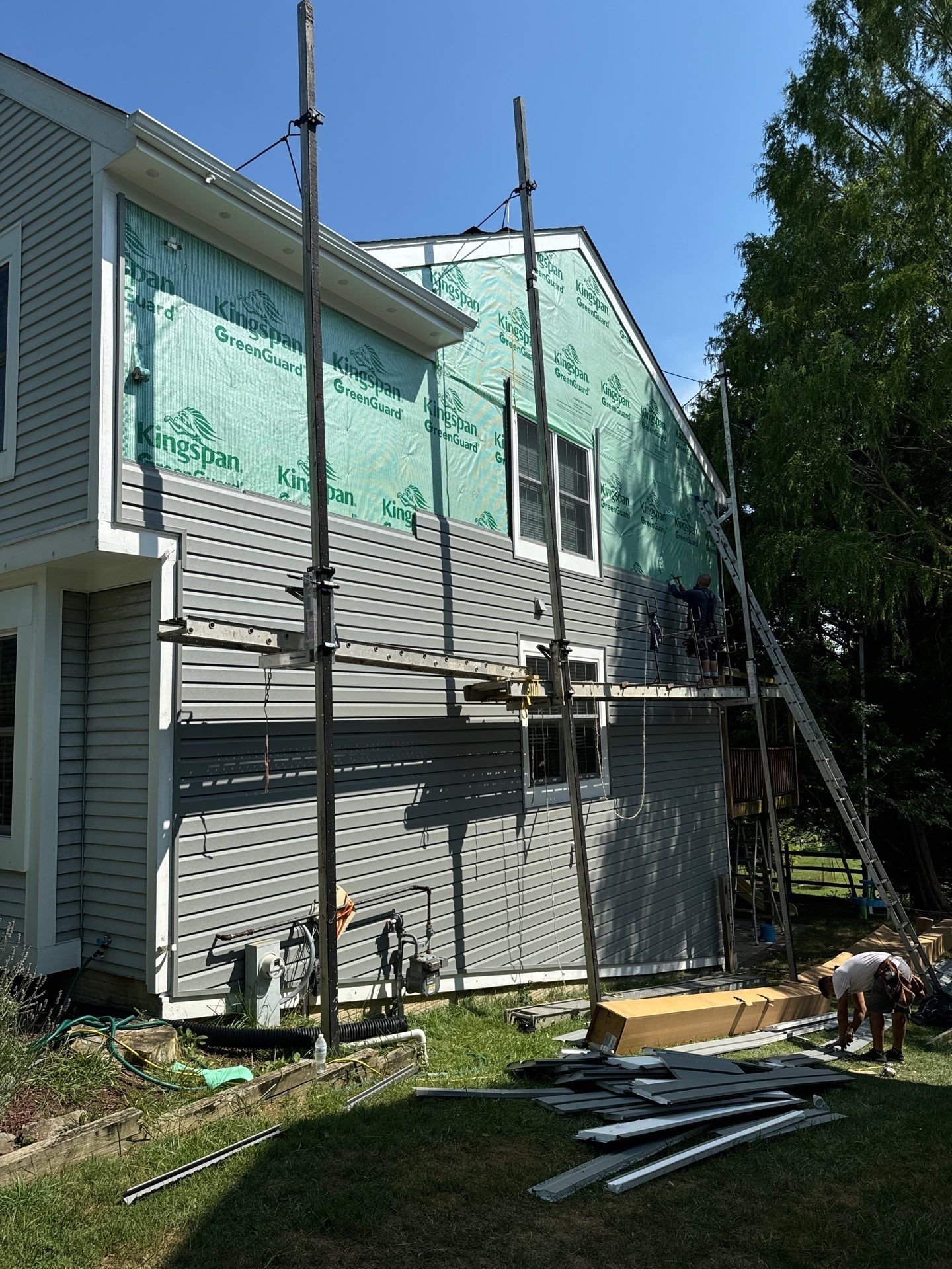 New Prodigy siding with One-piece insulated siding system & Exterior painting   by Alpha Design Services