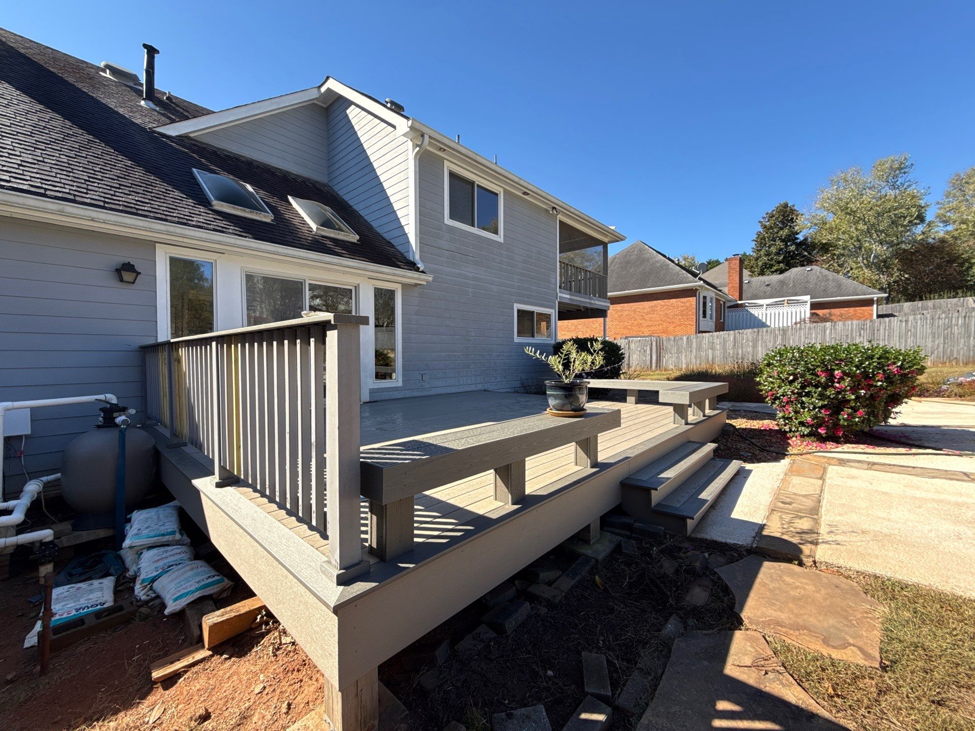 Custom Composite Deck with Integrated Seating in Roswell by Swift Home Renovations