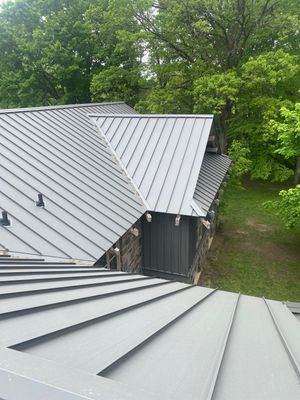 New Roof Installation using 16" Standing Seam Panels