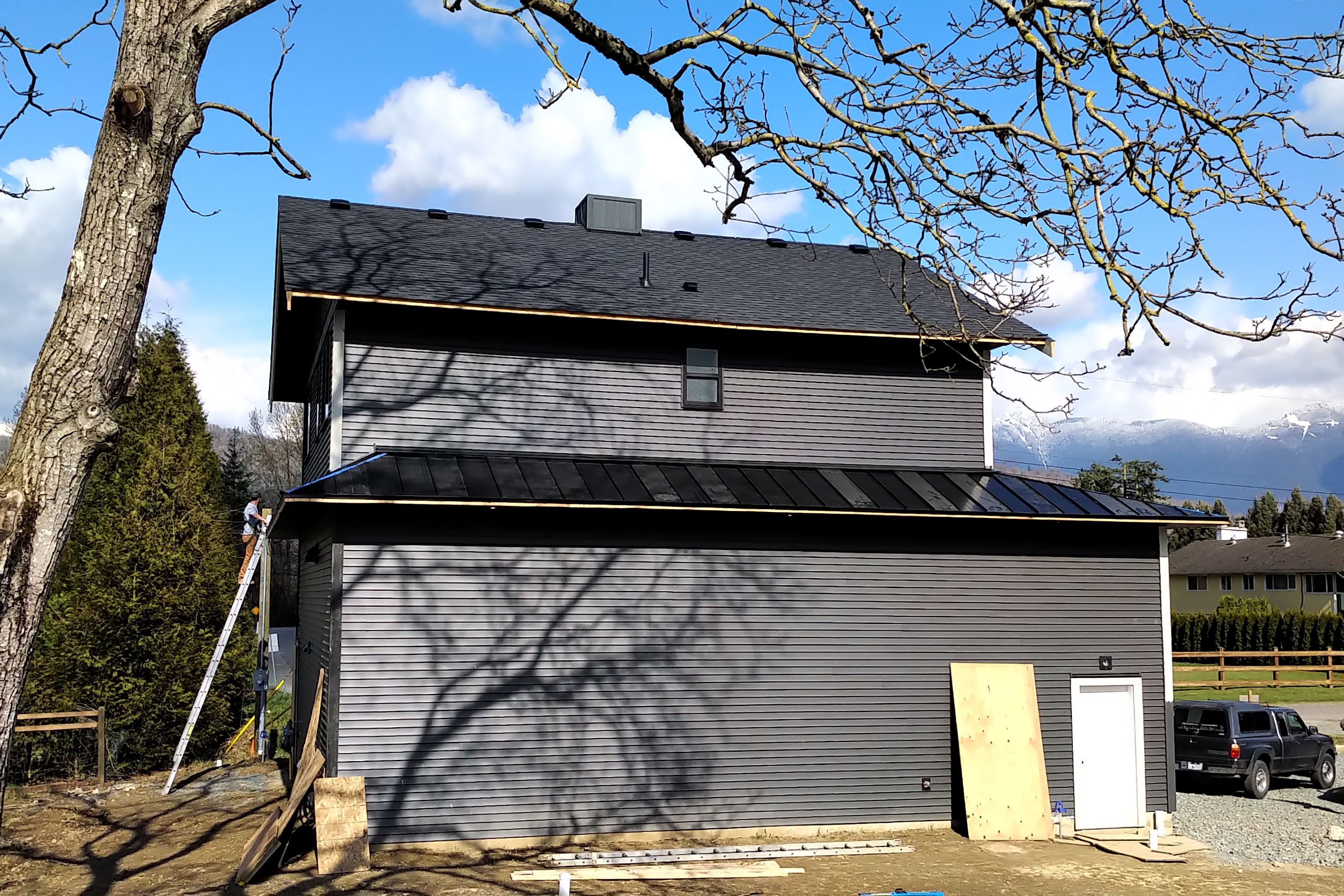 Residential Roofing Installation using 16" Prolok metal and Owens corning shingles by Top Notch Roofing Inc