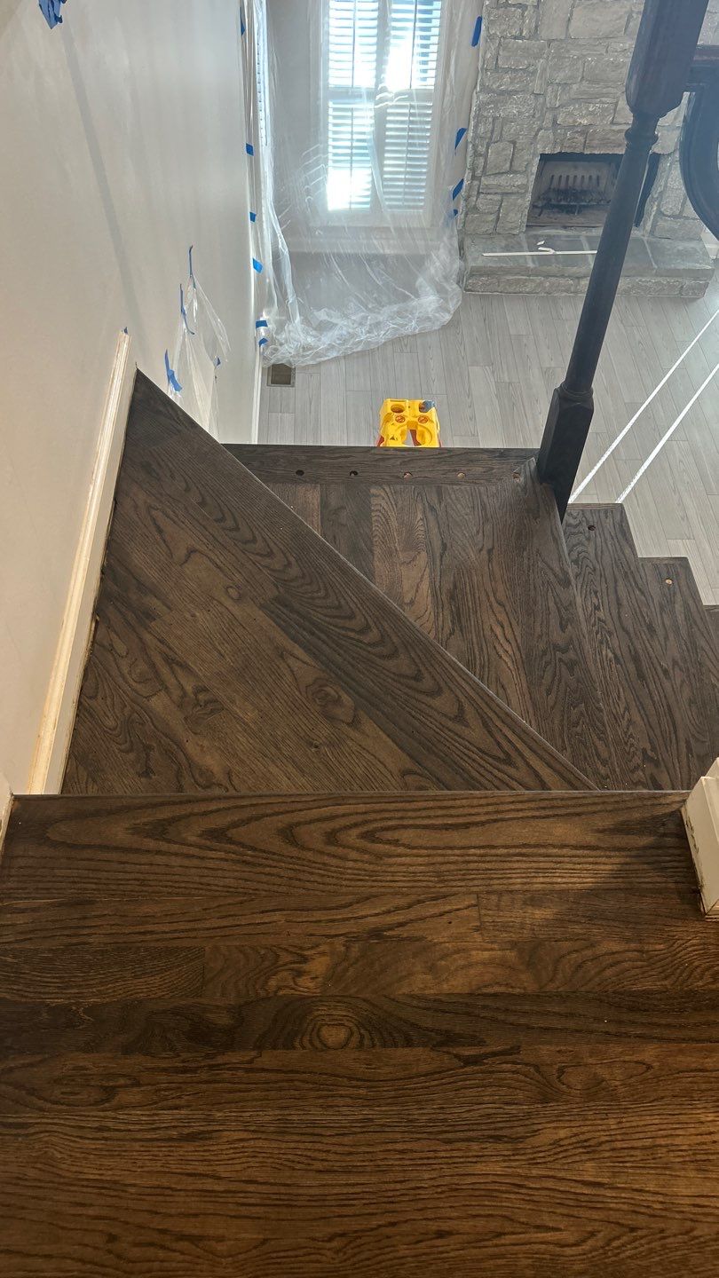 Updated staircase and hallway by Footprints Floors of Nashville