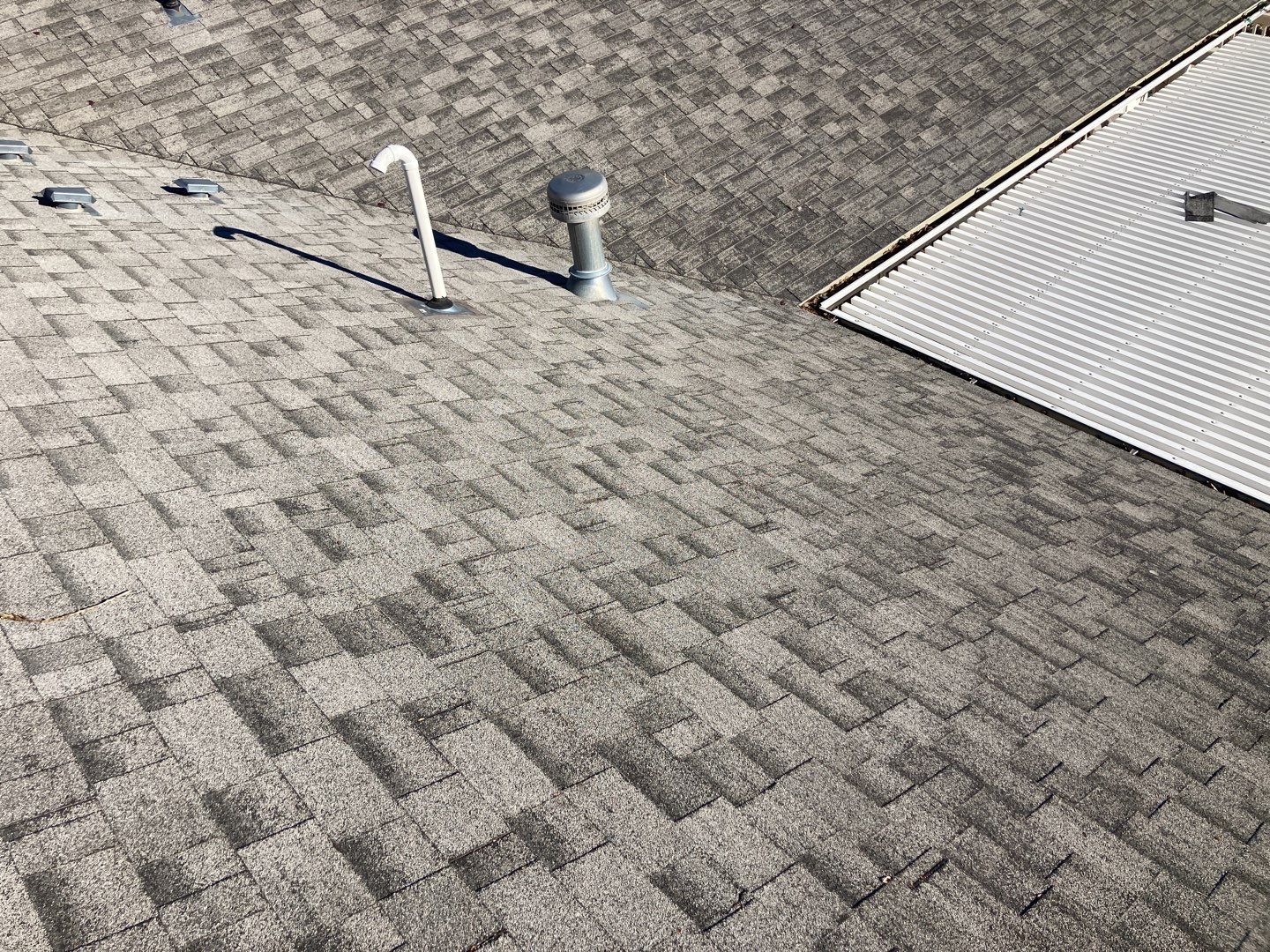 Two story farmhouse style roofing installation using Owens Corning Duration in the color Teak by ID Roofing LLC