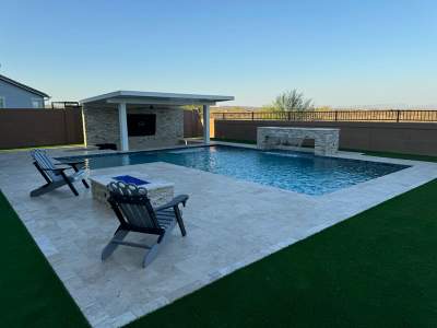 Pool build with custom water features & pergola