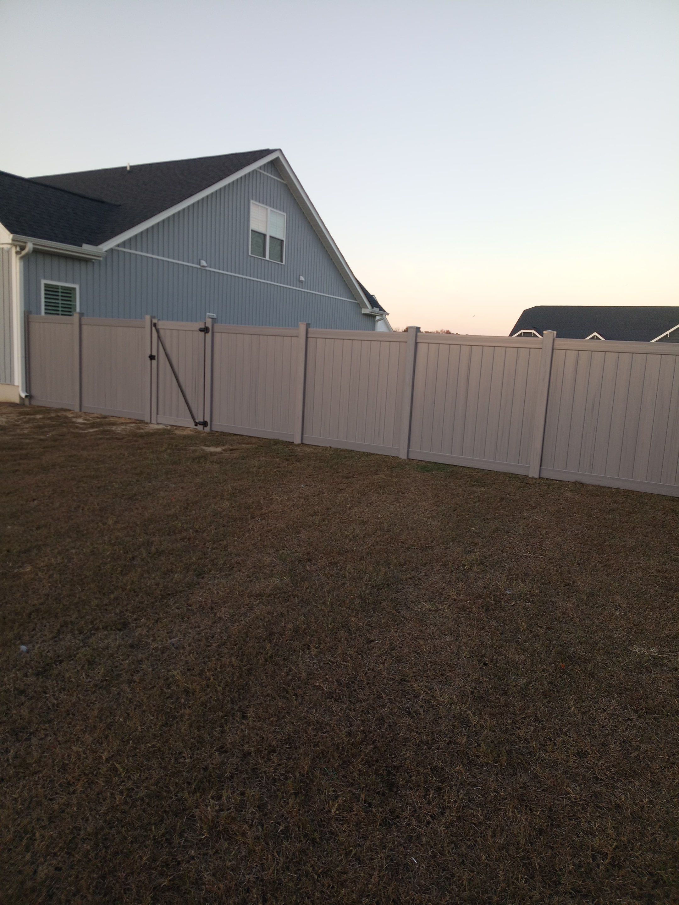 Gray Vinyl Project in Grimesland NC by Superior Fence and Rail