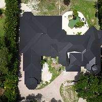 .032 Aluminum 1.5" Mechanical Seam Matte Black  by Total Roofing System The Metal Roof Experts