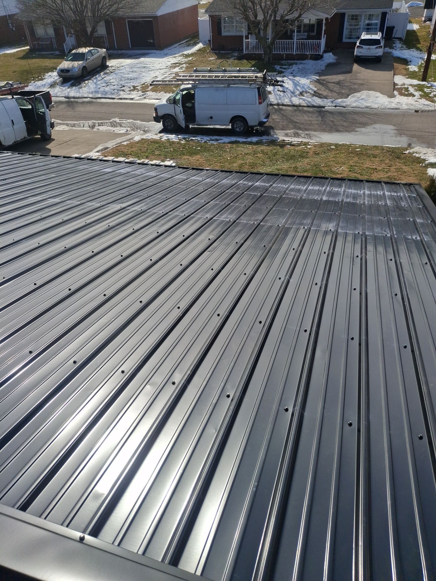 Residential Roofing Installation using Metal by Rainstoppers Roofing