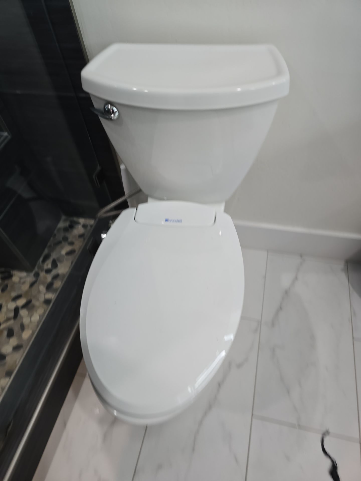 Installing New Toilet, Toilet Seal, and Checking Black Pipes in Ceiling by Us Plumbing