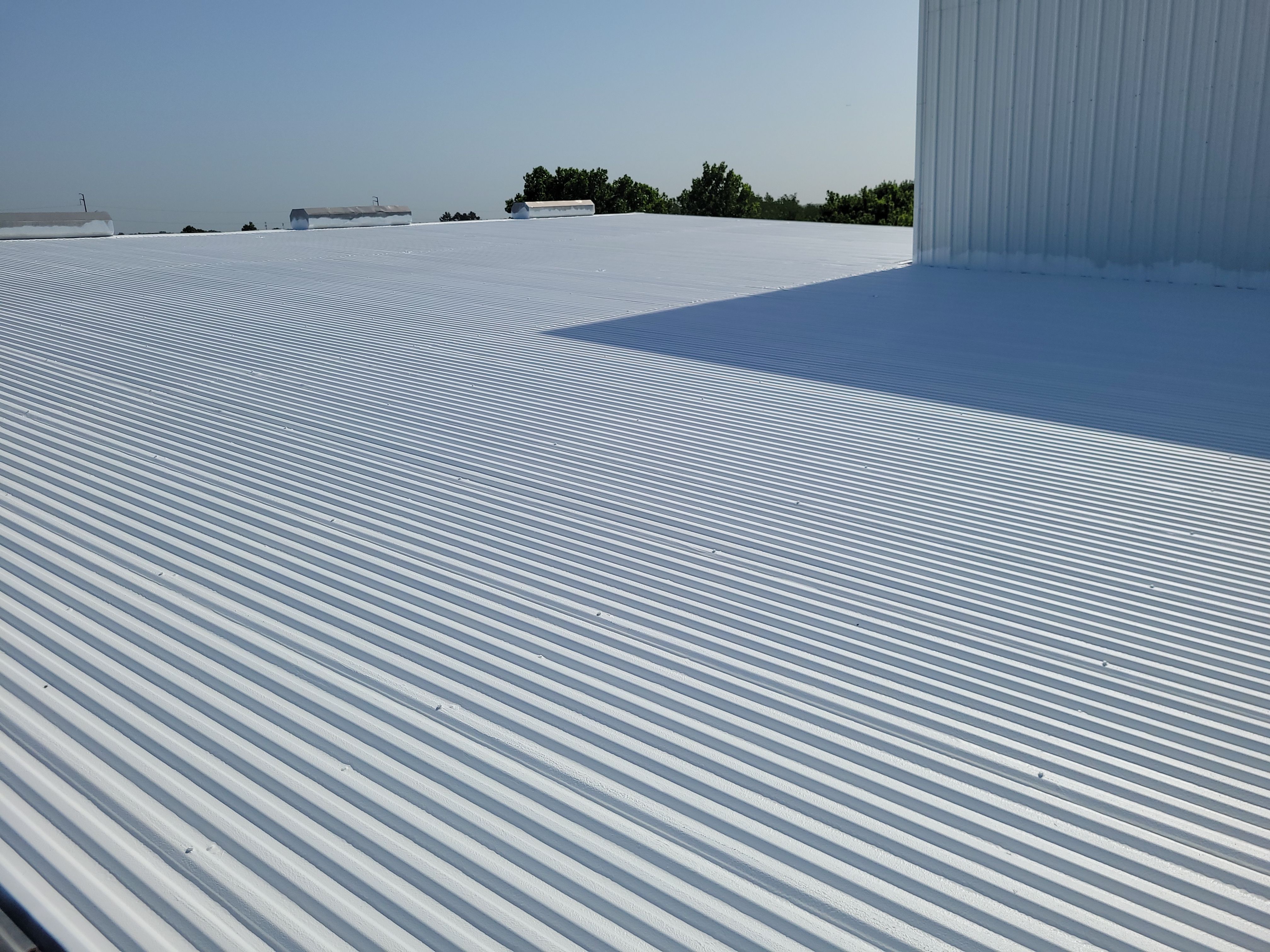 Commercial Metal Restoration System using Aldocoat Coatings by Hostetler Roofing