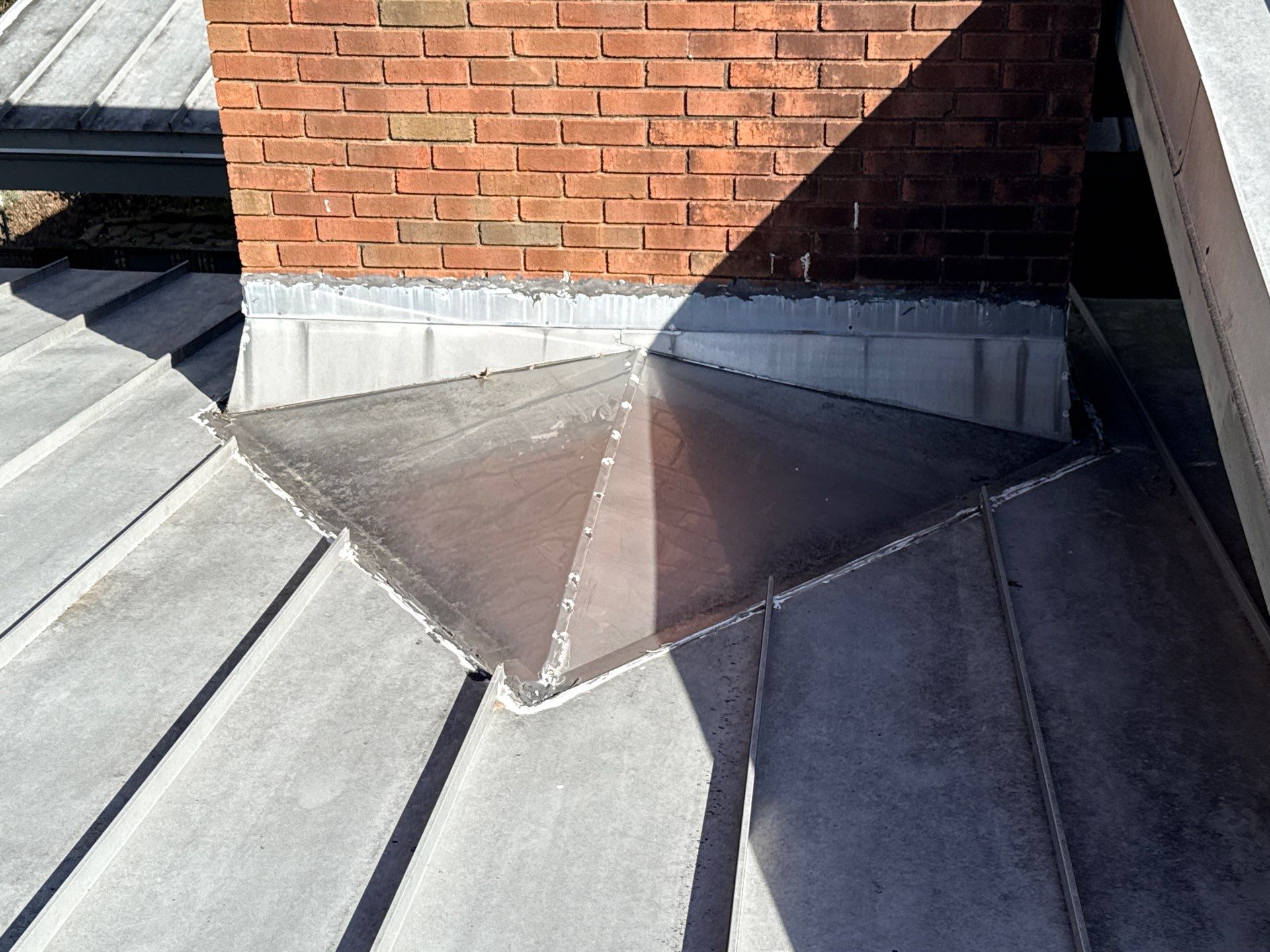 Residential Standing Seam Metal Roof and Membrane Replacement in Memphis by Revival Roofing Services