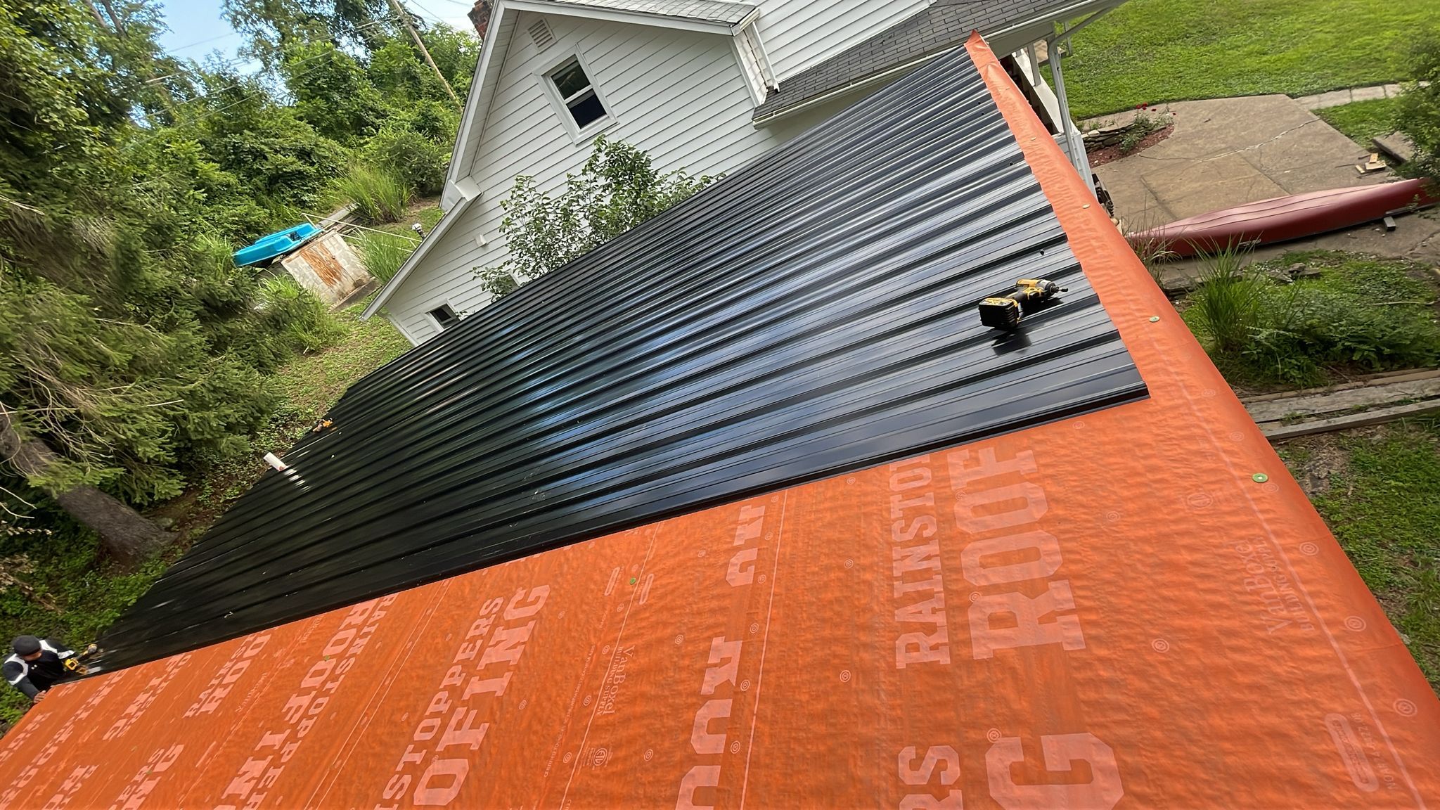 Residential Roofing Installation using Metal by Rainstoppers Roofing