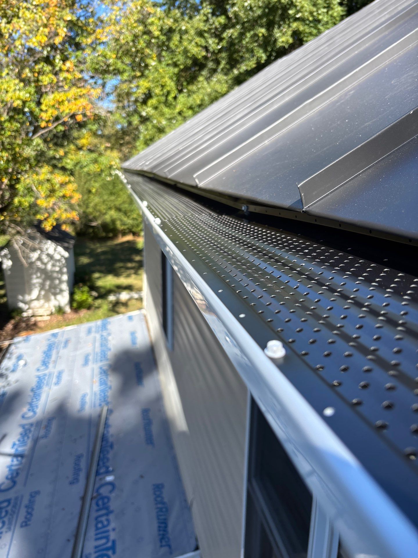 Metal Roof and Gutter Replacement by Winchester Roofing
