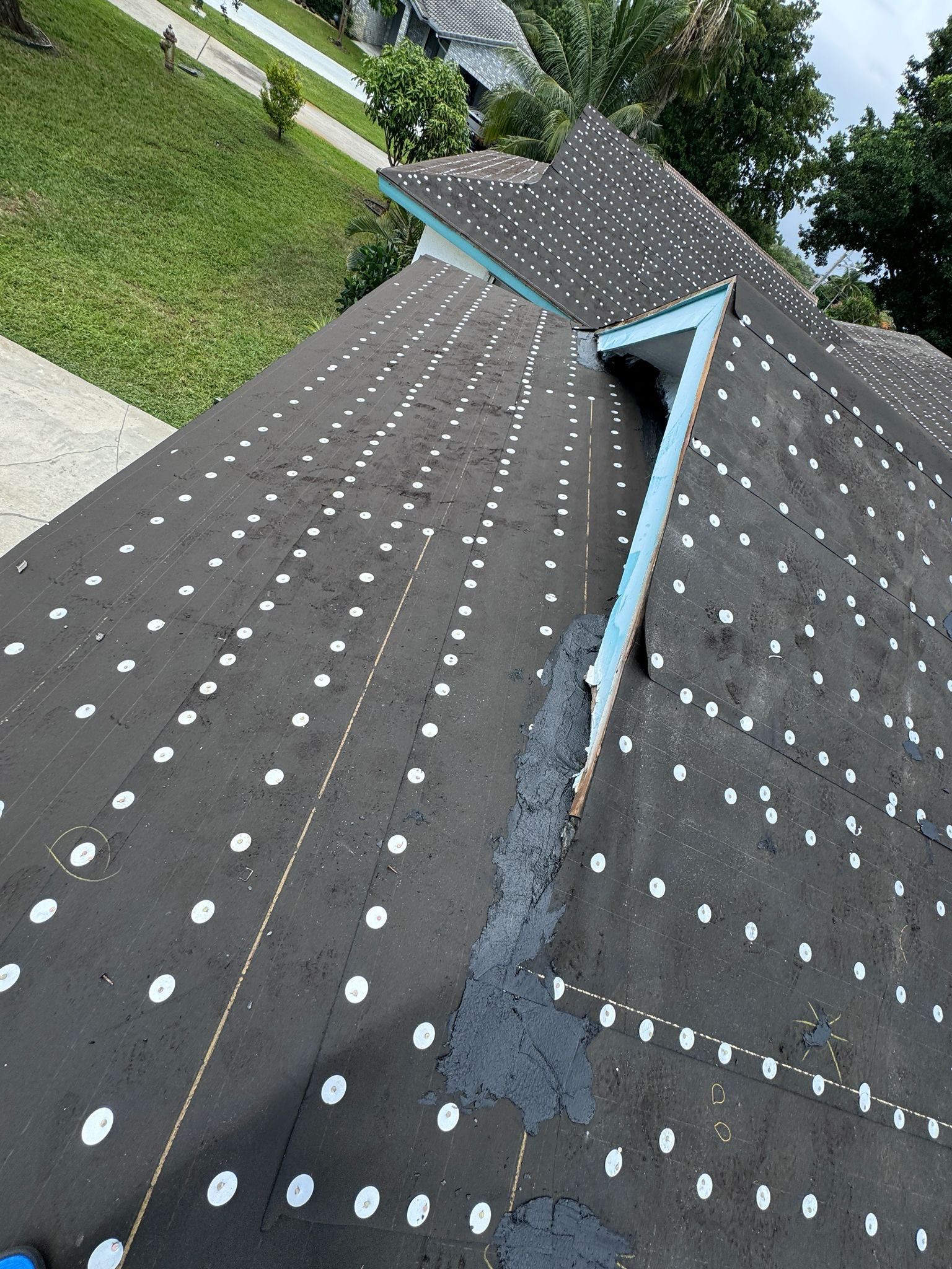 Residential Roofing Installation using 1" Nail strip metal roof by BLUES BROTHERS ROOFING