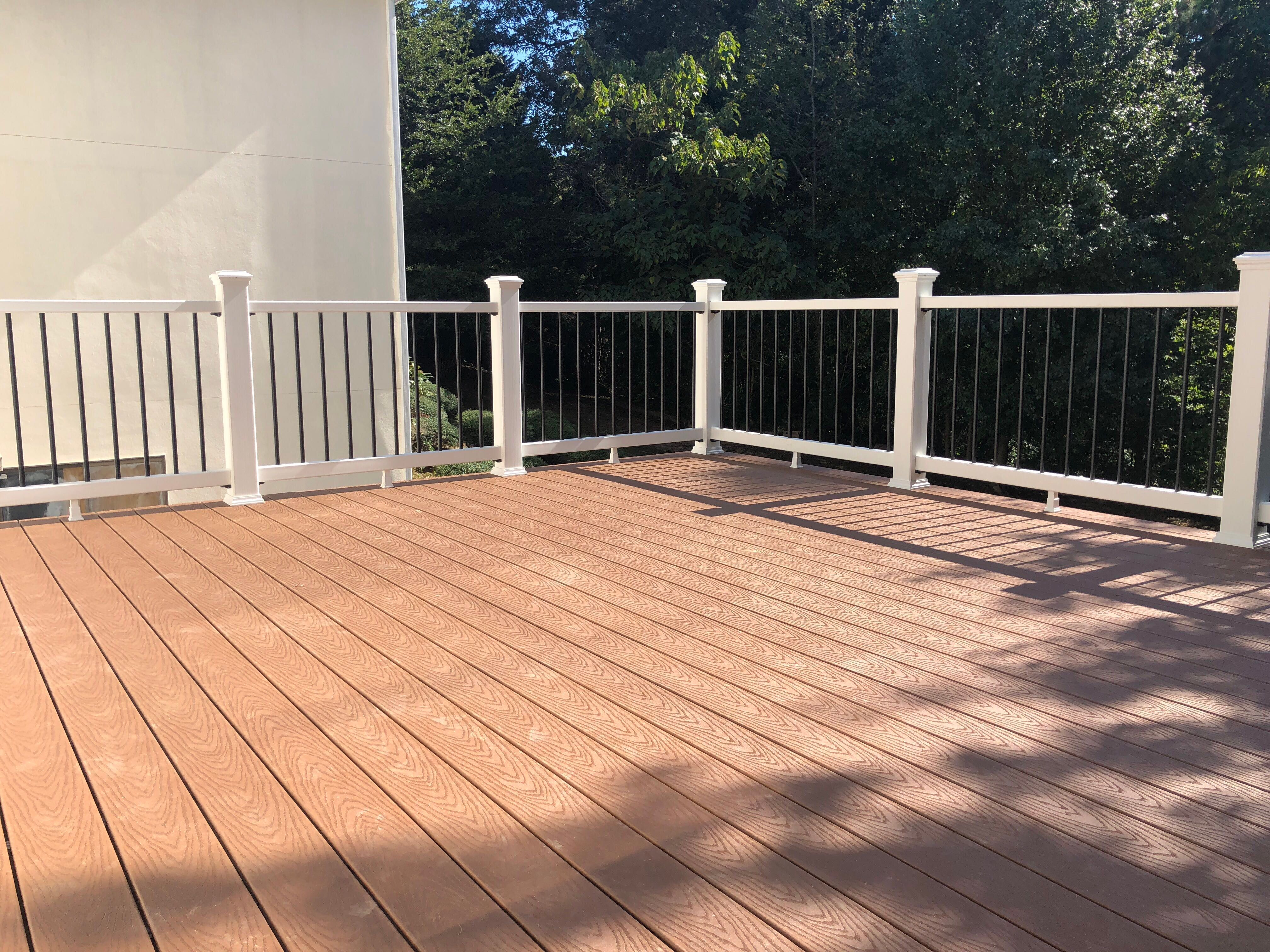 Elevated Composite Deck and Concrete Patio Installation in Atlanta by Swift Home Renovations