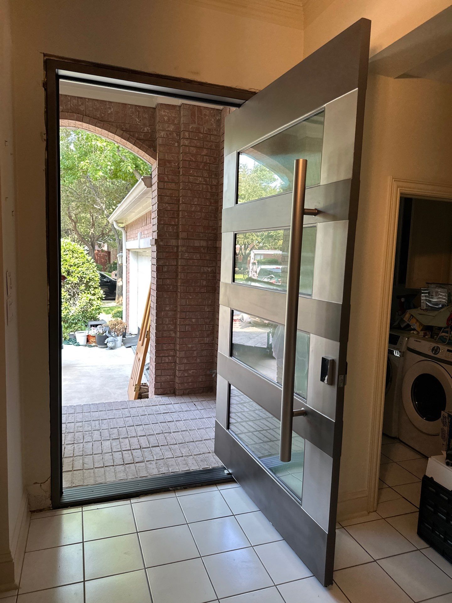 Modern Metal and Glass Entry Door Fabrication and Installation by Solara Custom Living