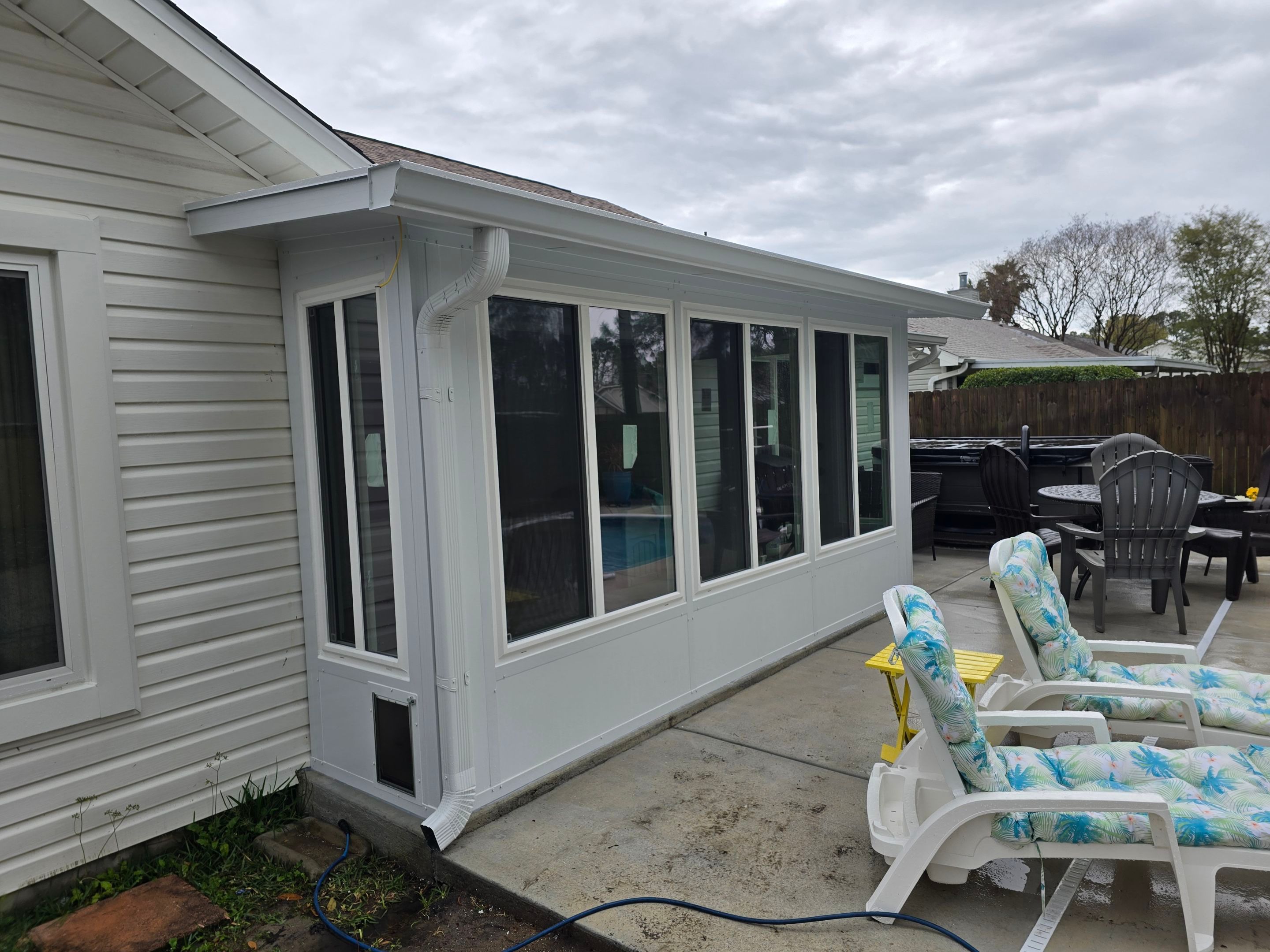 Poolside Glass Room in Gulf Breeze by Titan Sunrooms
