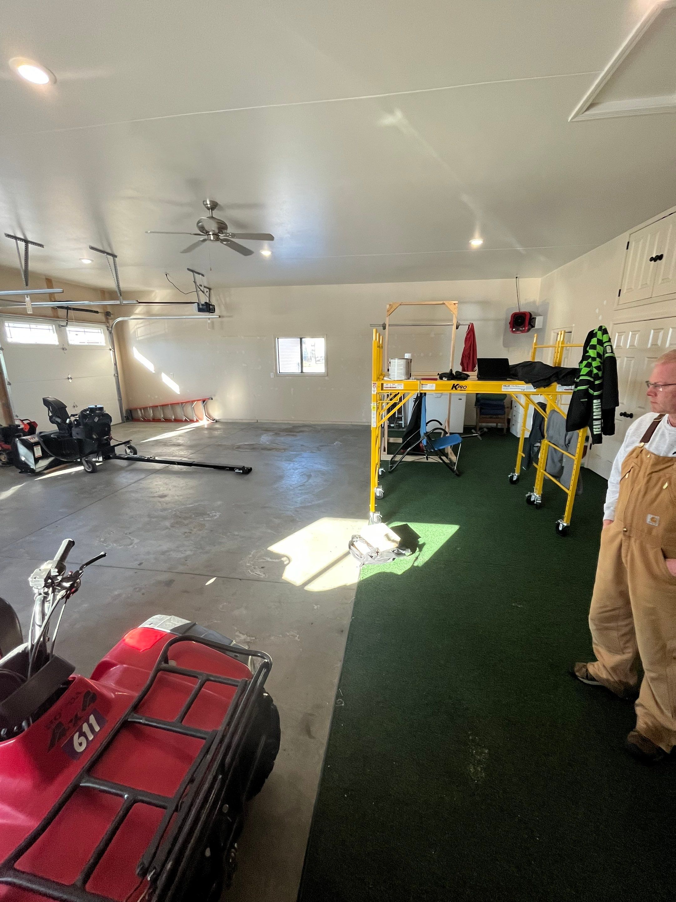 Garage using Mediterranean by Select Painting, Coatings & Garage Cabinets