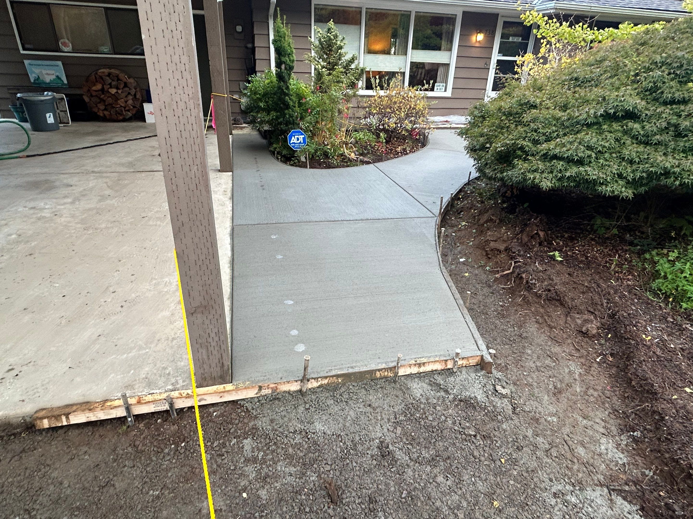 Edie | Concrete Driveway and Walkway  by Jireh Asphalt & Concrete Inc 