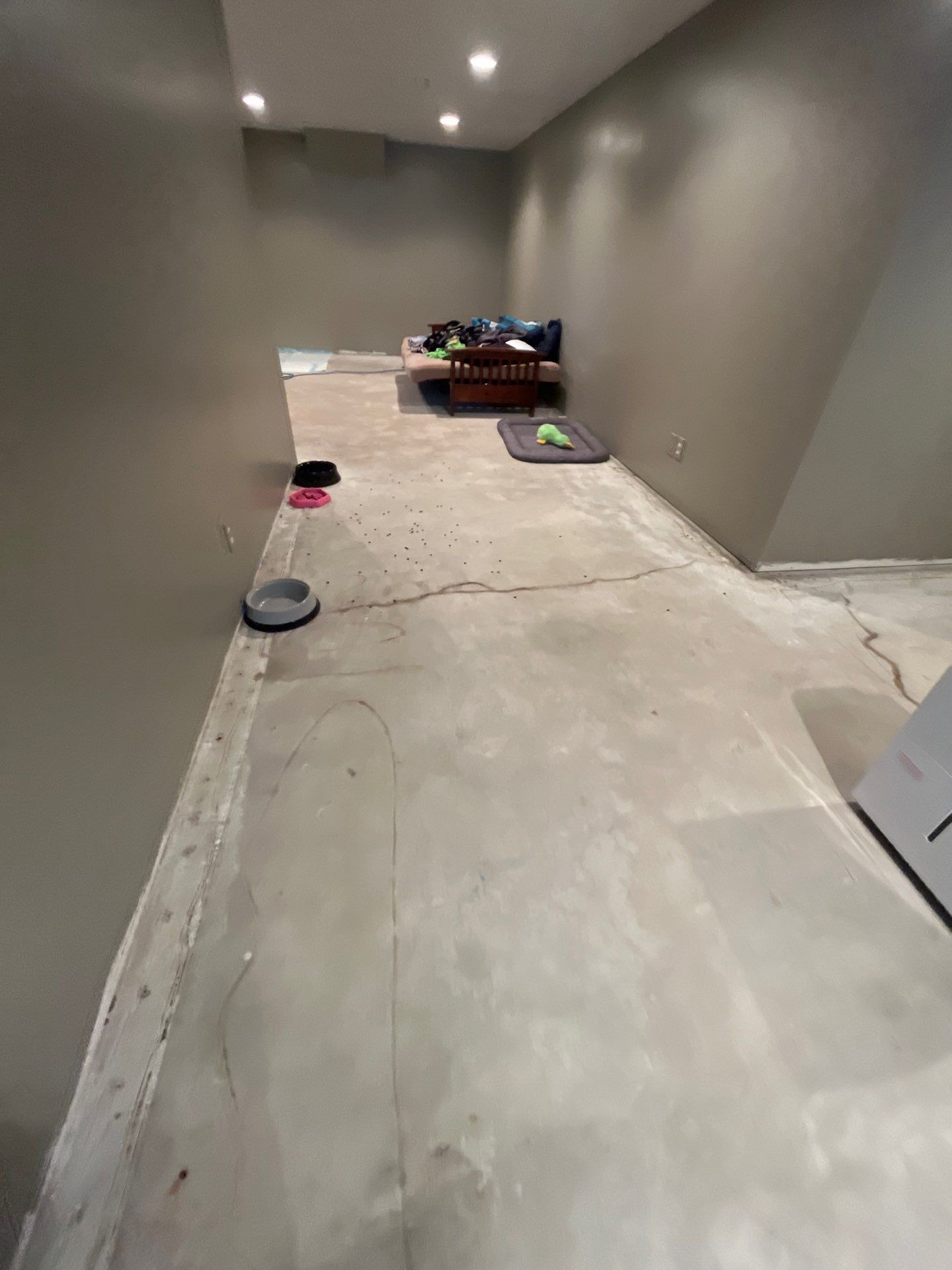 Custom Multi-Fleck Epoxy Floor Coating for Residential Basement by Select Painting, Coatings & Garage Cabinets
