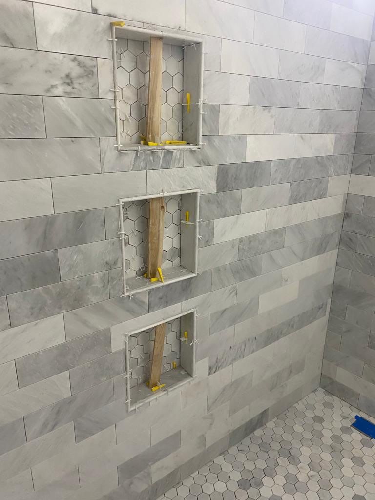 Bathroom Remodel using Tile by Home Concepts Construction