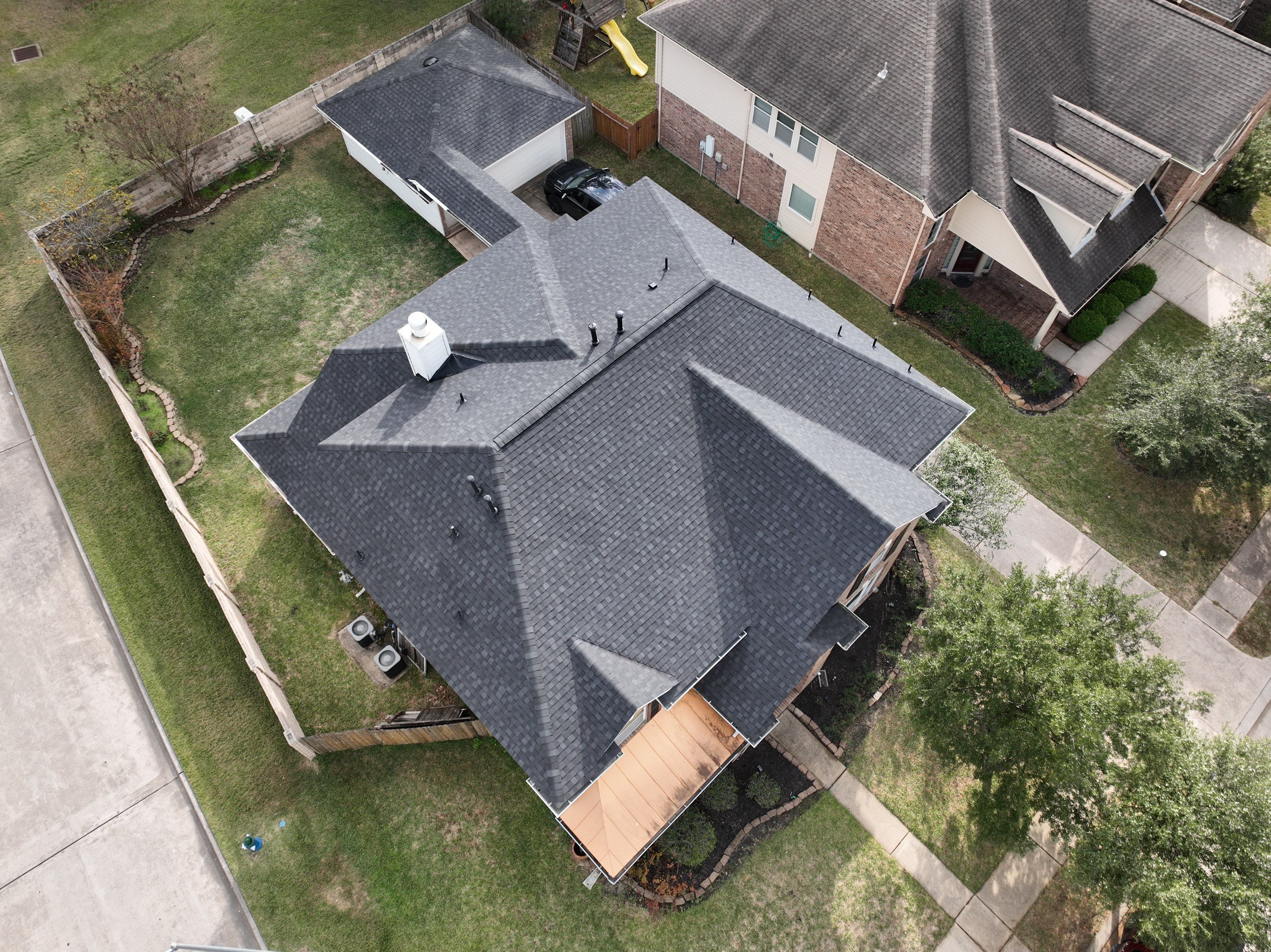 Tamko Titan XT - Rustic Black by Roof Concepts Construction