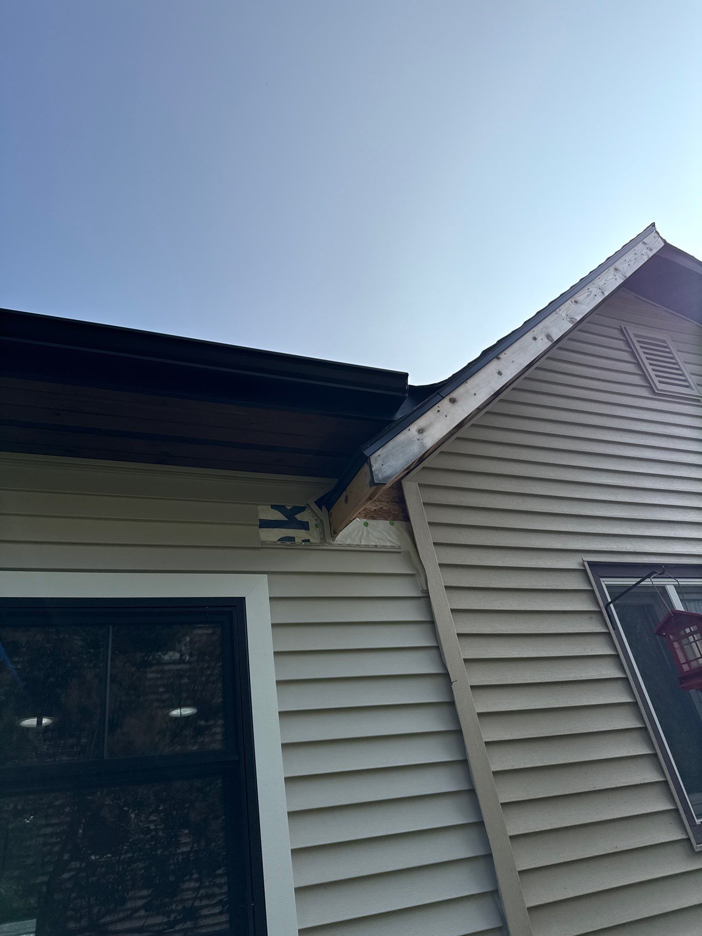 Residential Gutter and Downspout Installation in Elk Rapids by Rainbow Seamless Systems
