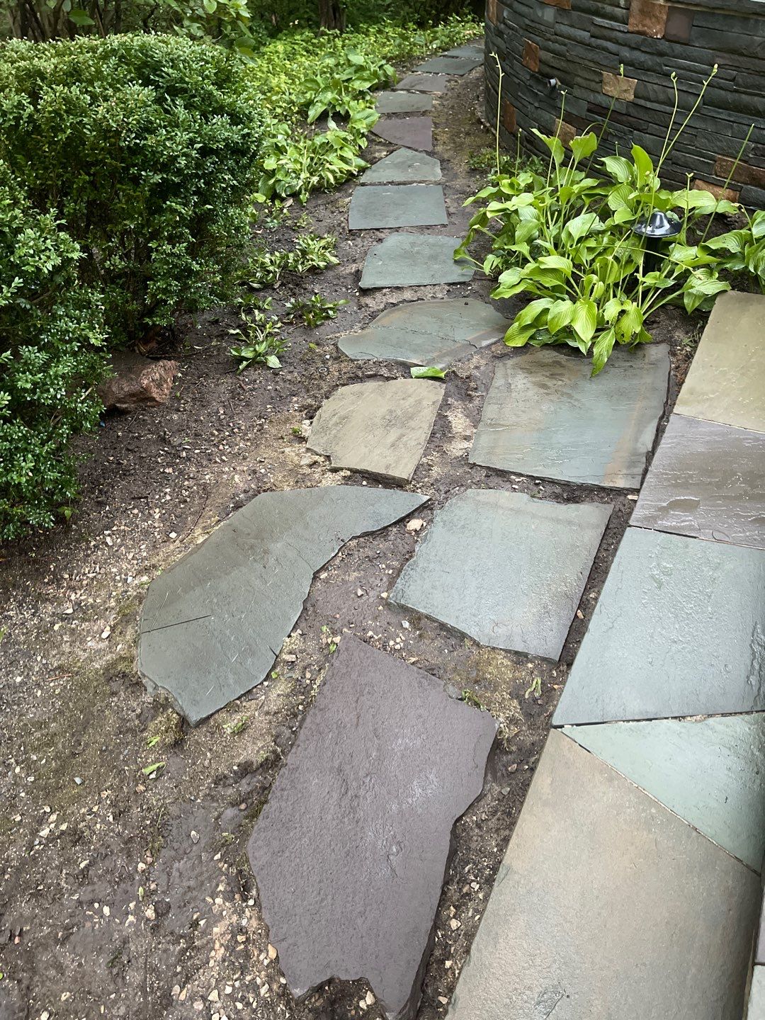 Bluestone patio cleaning by Northern Power Washing LLC.