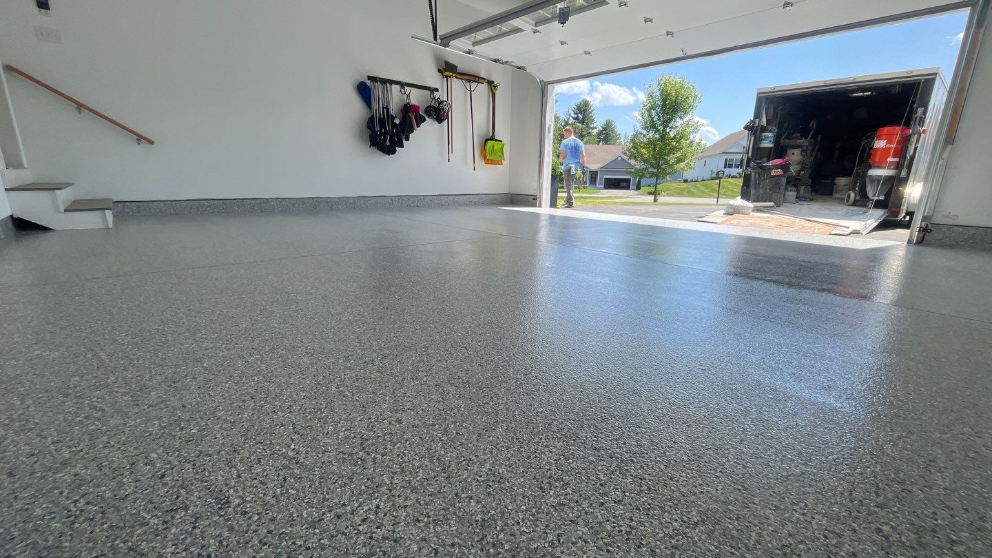 Garage in Londonderry, NH 03053 by Symphony Concrete Coatings