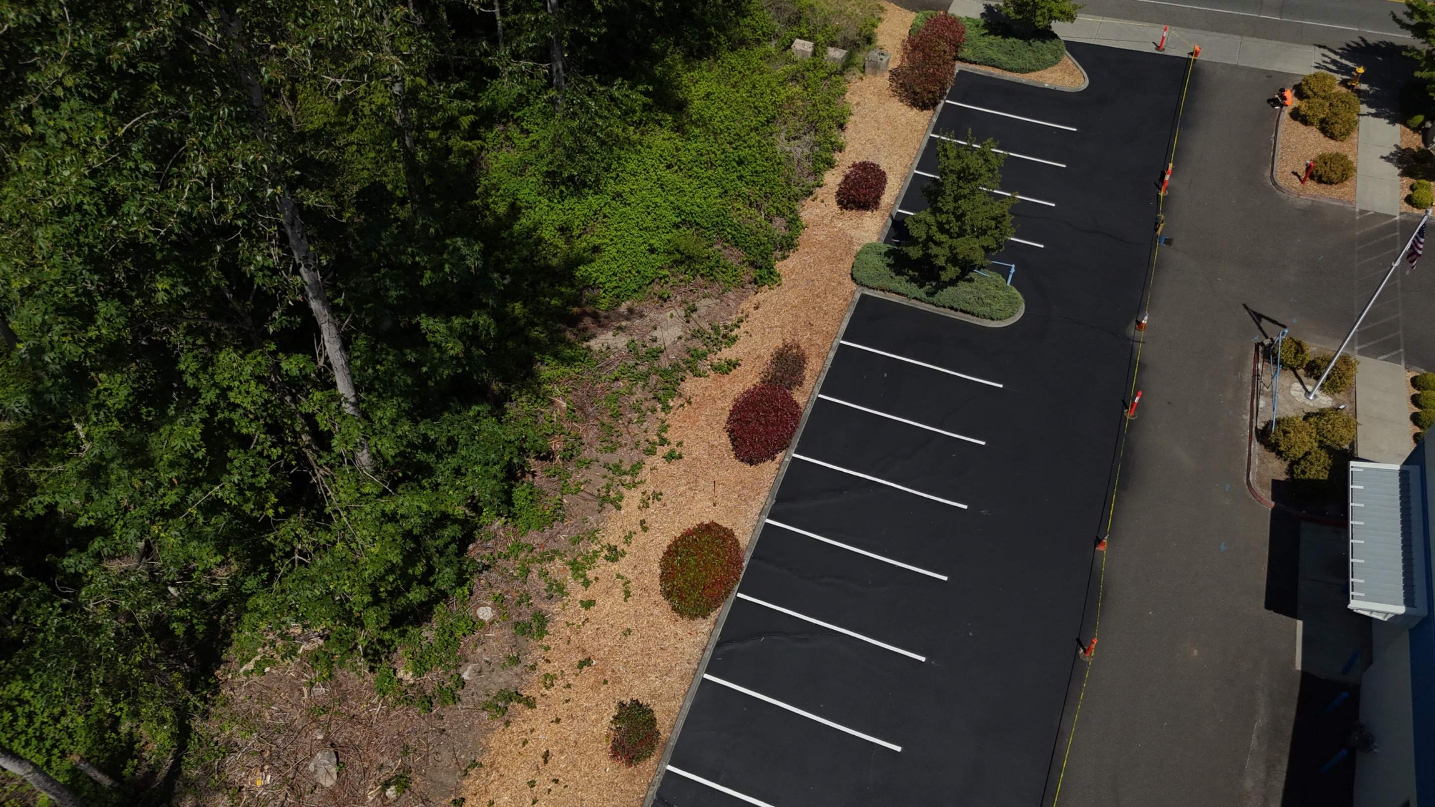 King Machine Business Parking Lot Sealcoat Overlay | Mukilteo by Jireh Asphalt & Concrete Inc 