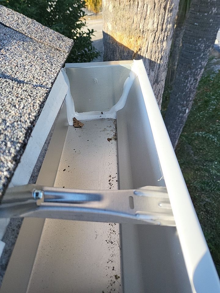 Seamless Gutter Installation Using White K-Style Gutters by Gutter Professors