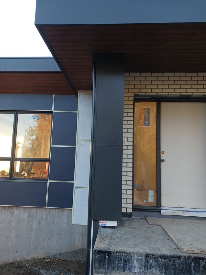 Residential Roofing Installation using multiple products by Top Notch Roofing Inc