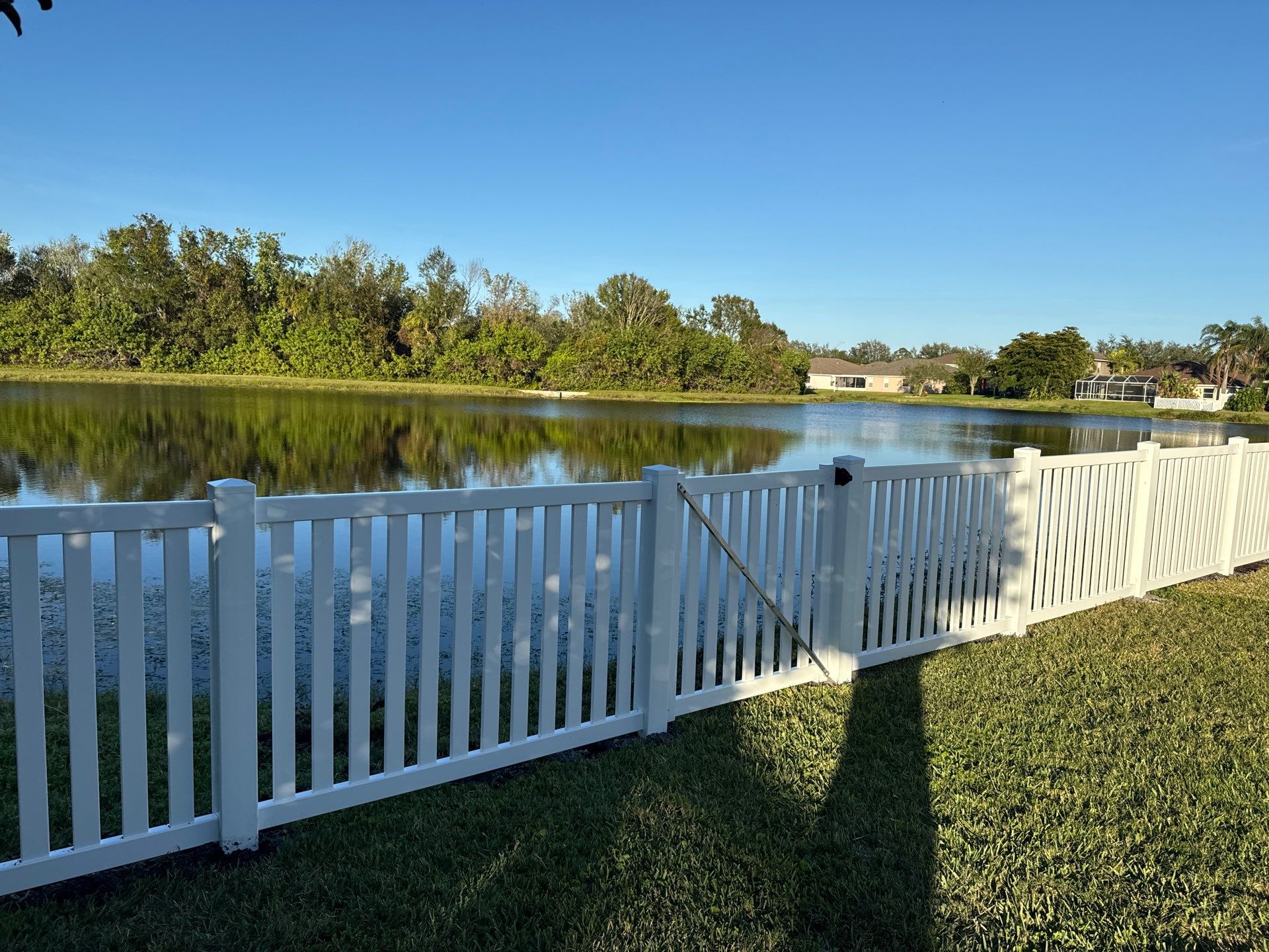 Vinyl Picket Fence Installation using 6Ft White Vinyl Privacy Fence with a 4Ft White Clearwater Picket Fence by Asap fence and gates, LLC