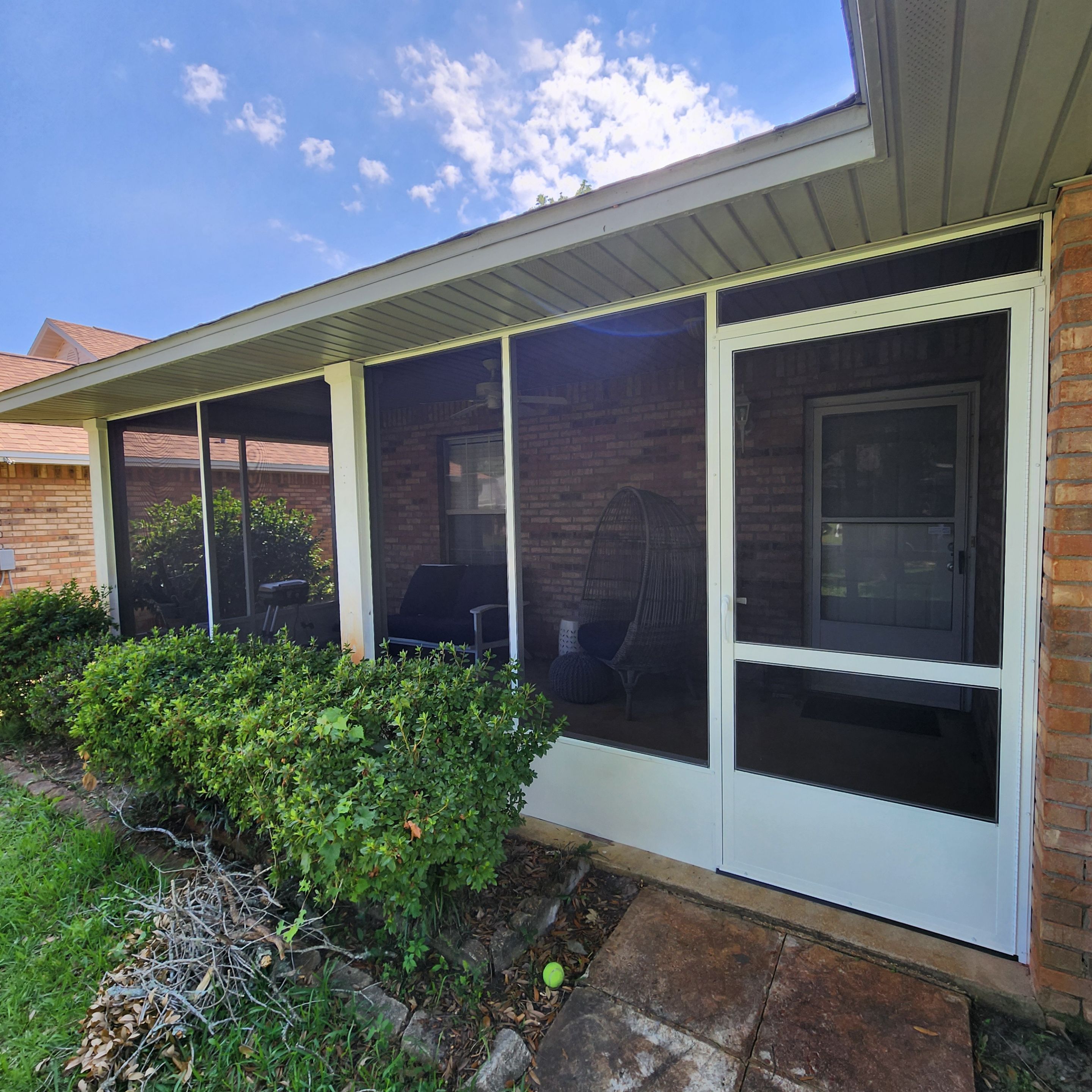 Screen Under Existing Patio Cover by Titan Sunrooms