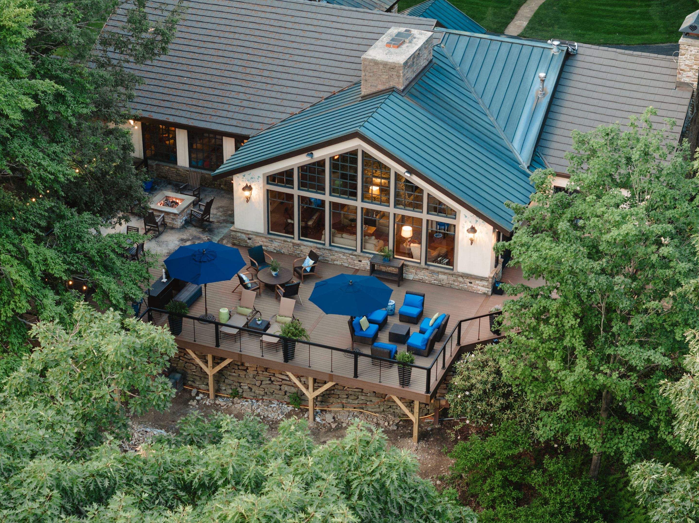 1500 sq/ft Composite Deck Build with Outdoor Kitchen in Champion by Cousins Roofing Siding & Decks