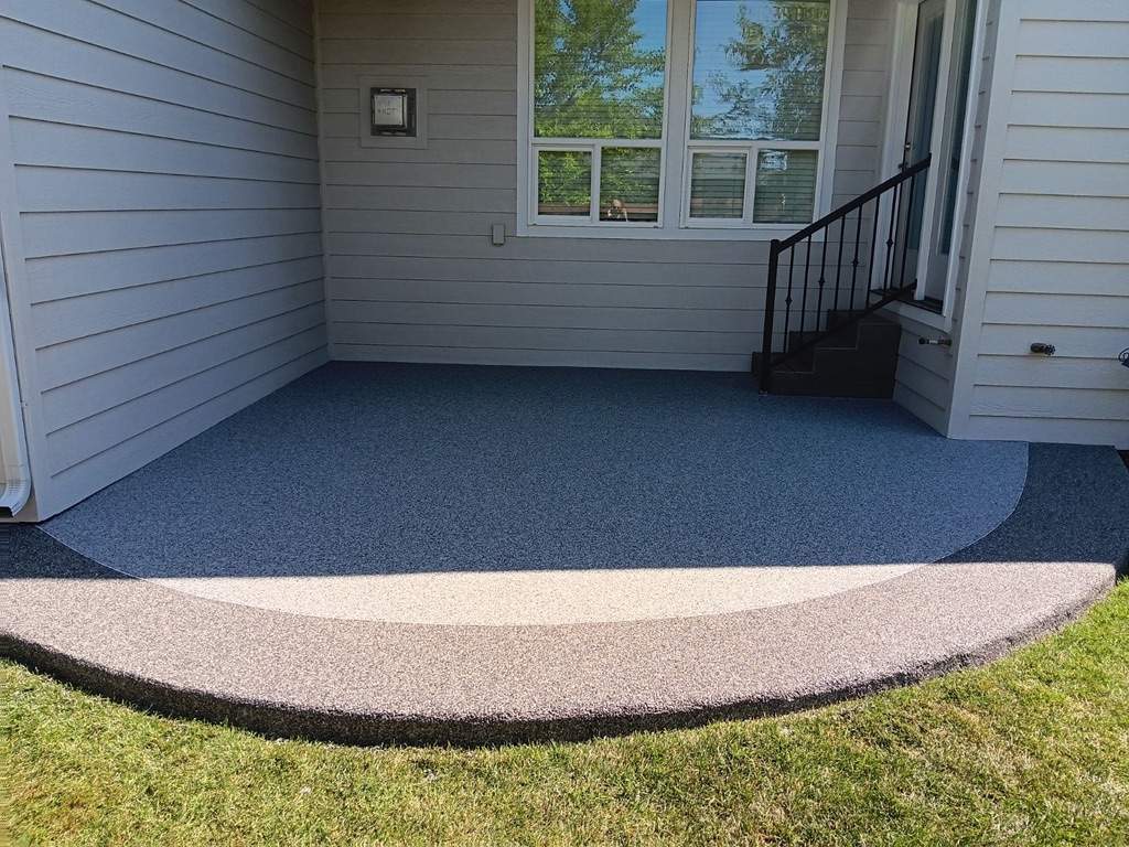 Gorgeous Bordered Patio with Vuba Stone by Mr. Mudd Concrete