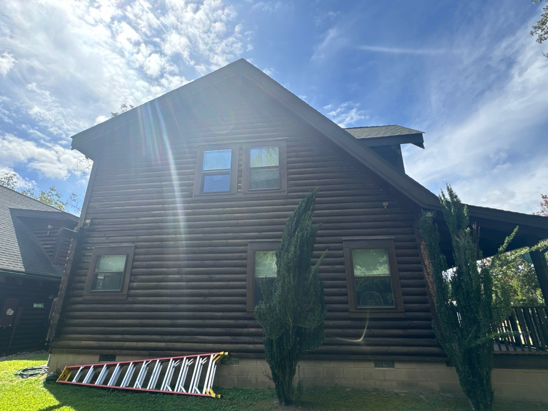 Smithfield Log Cabin by AKK Painting LLC