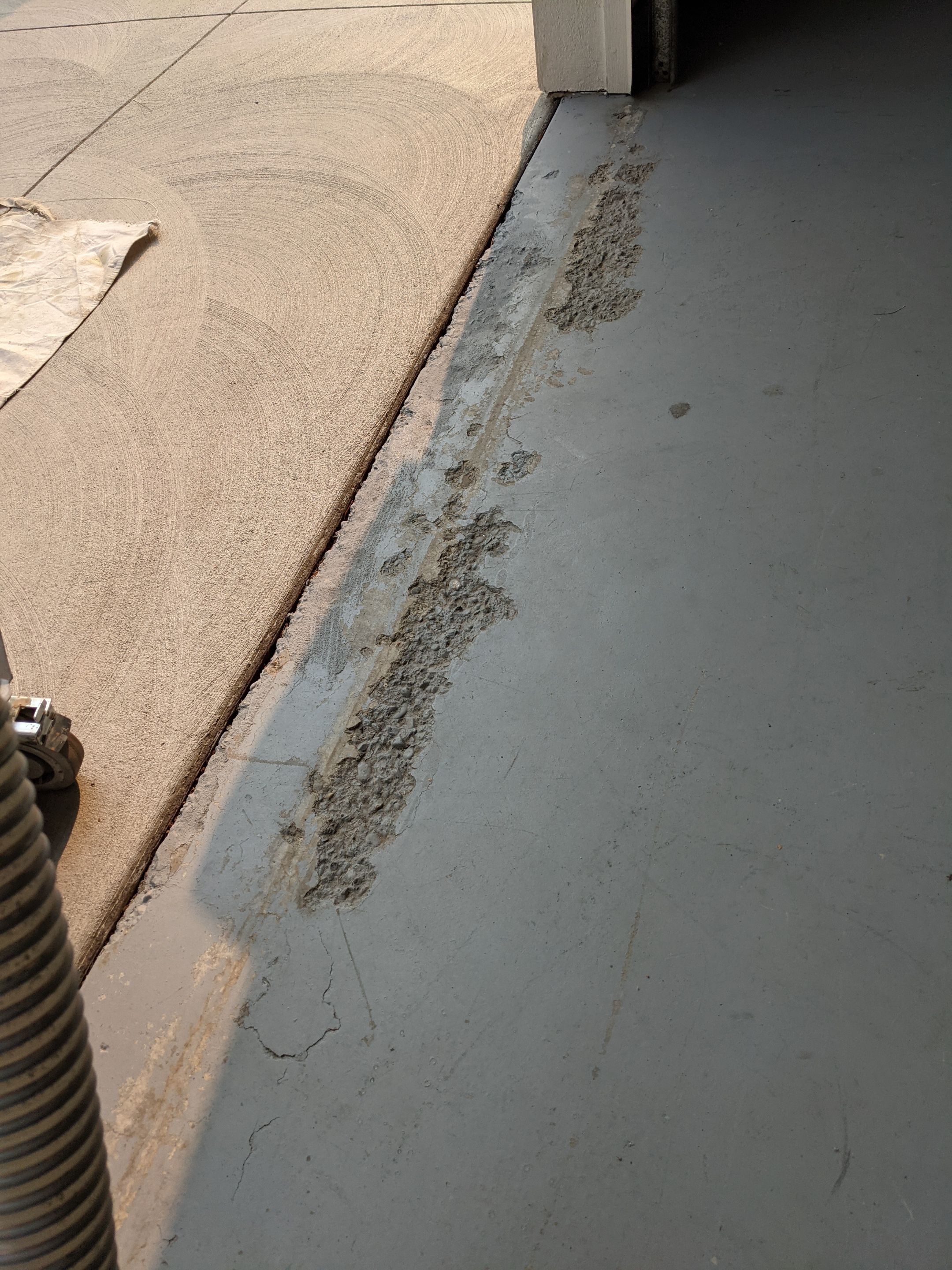 Garage Transformation using Slate Stone by Croc Coatings, LLC
