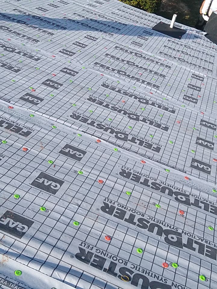 Residential Roofing Installation using Roof Replacement by American Roofing & Construction LLC