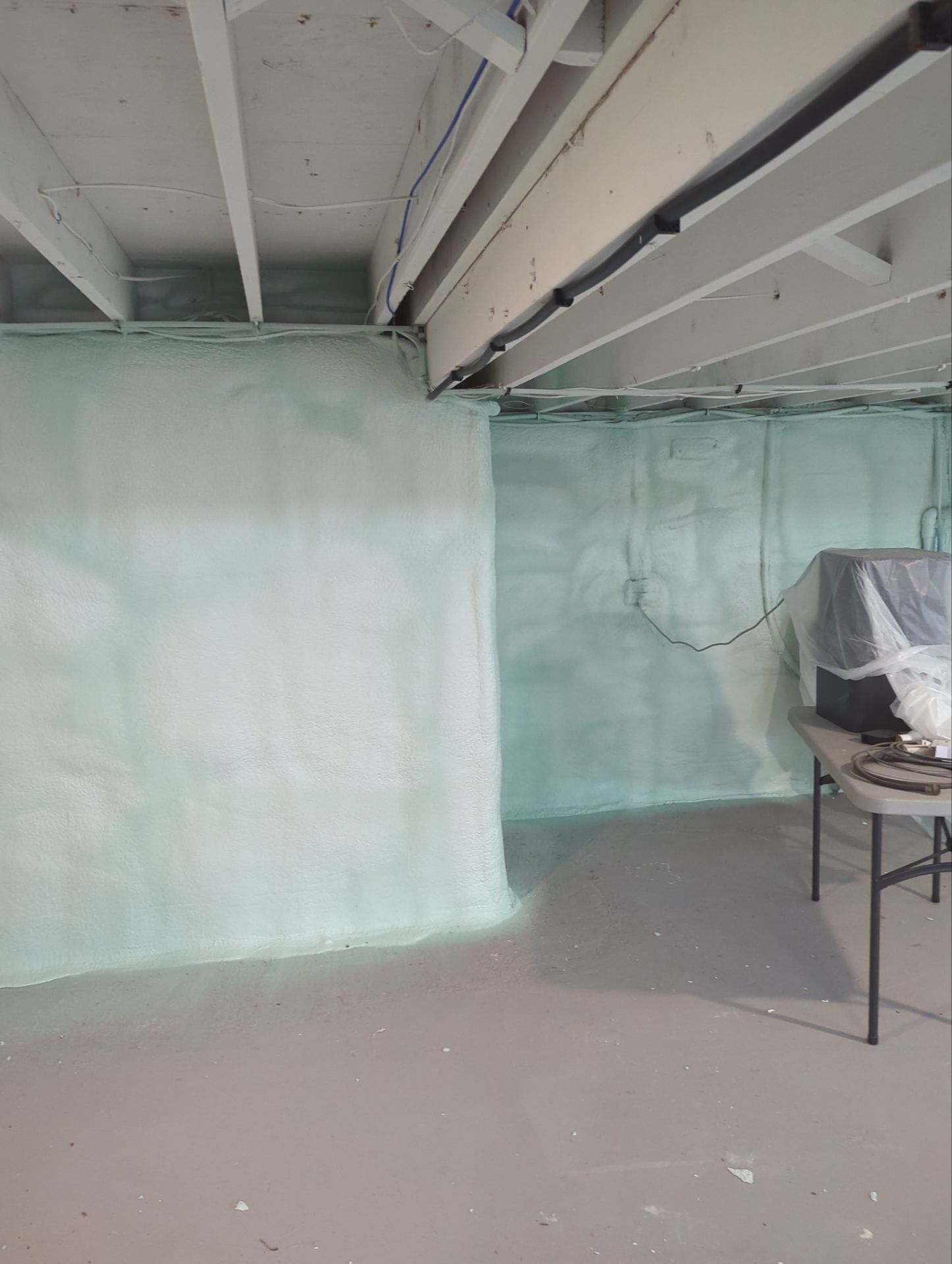Basement Exterior Walls using Closed Cell Spray Foam by NYS Foam & Energy