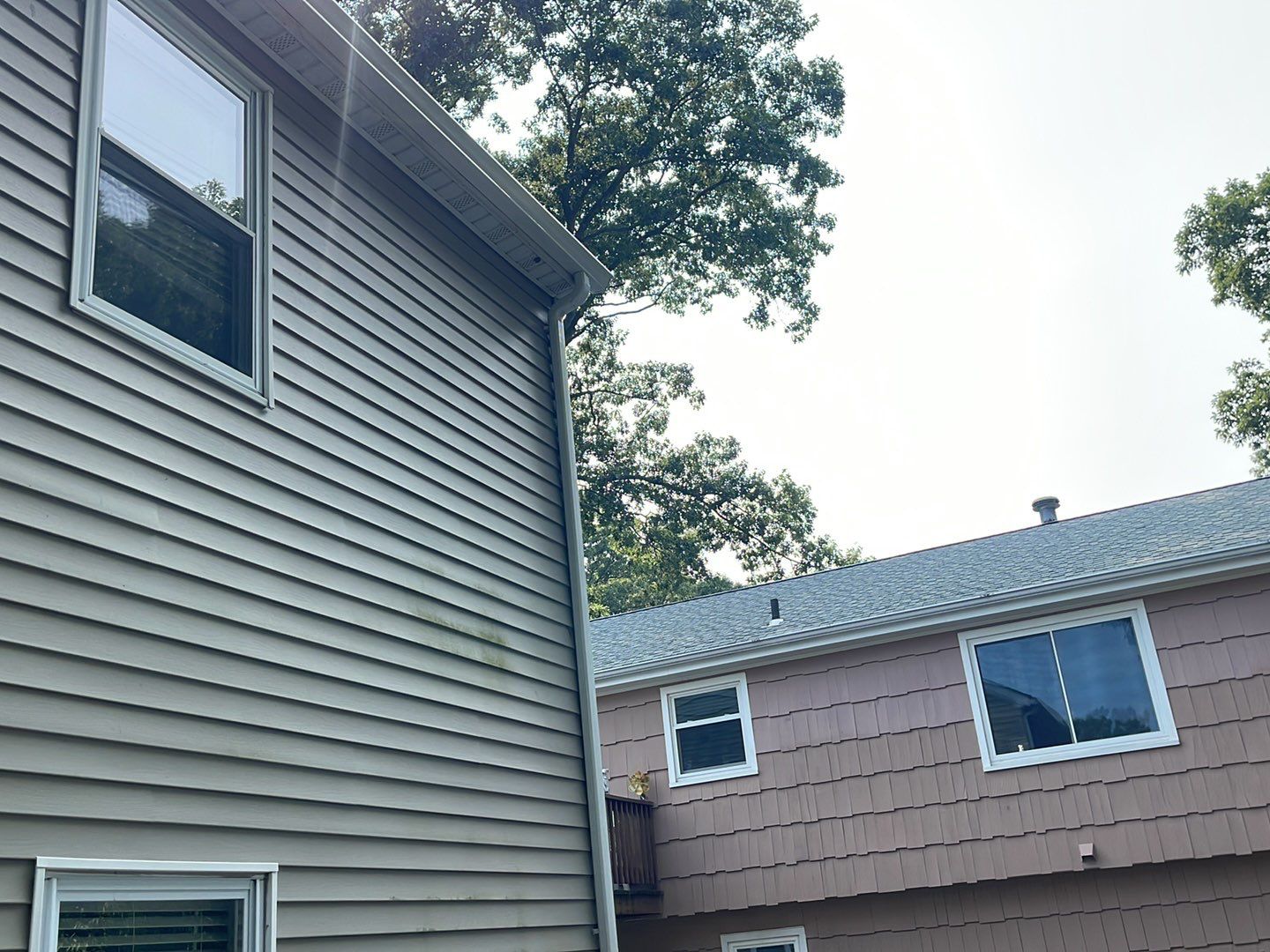 Gutter Installation using 5k White gutters by A Plus Exterior