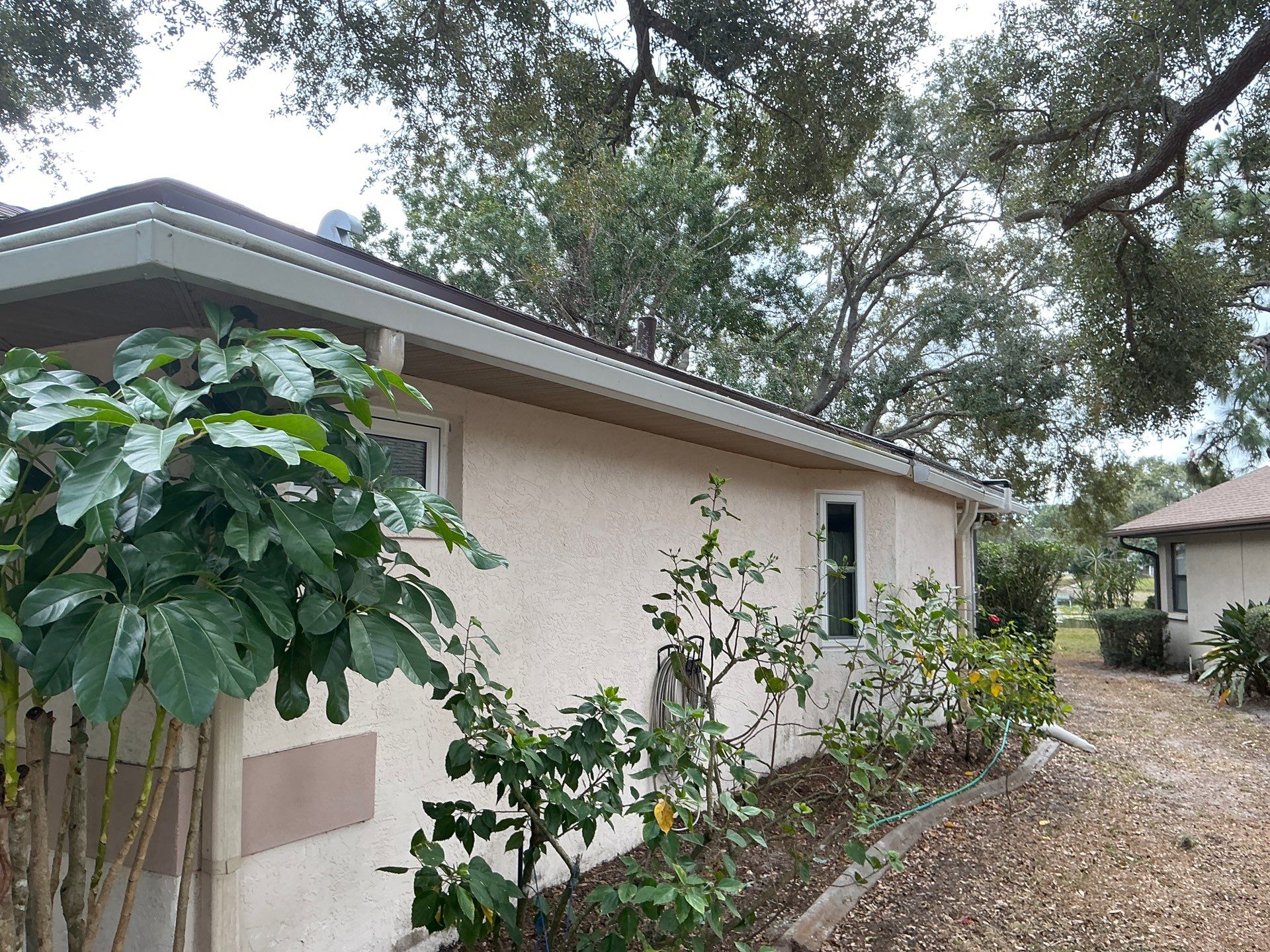 Seamless Aluminum Gutter Installation using 6 Inch Seamless Gutters in Sarasota FL by Gutter Professors