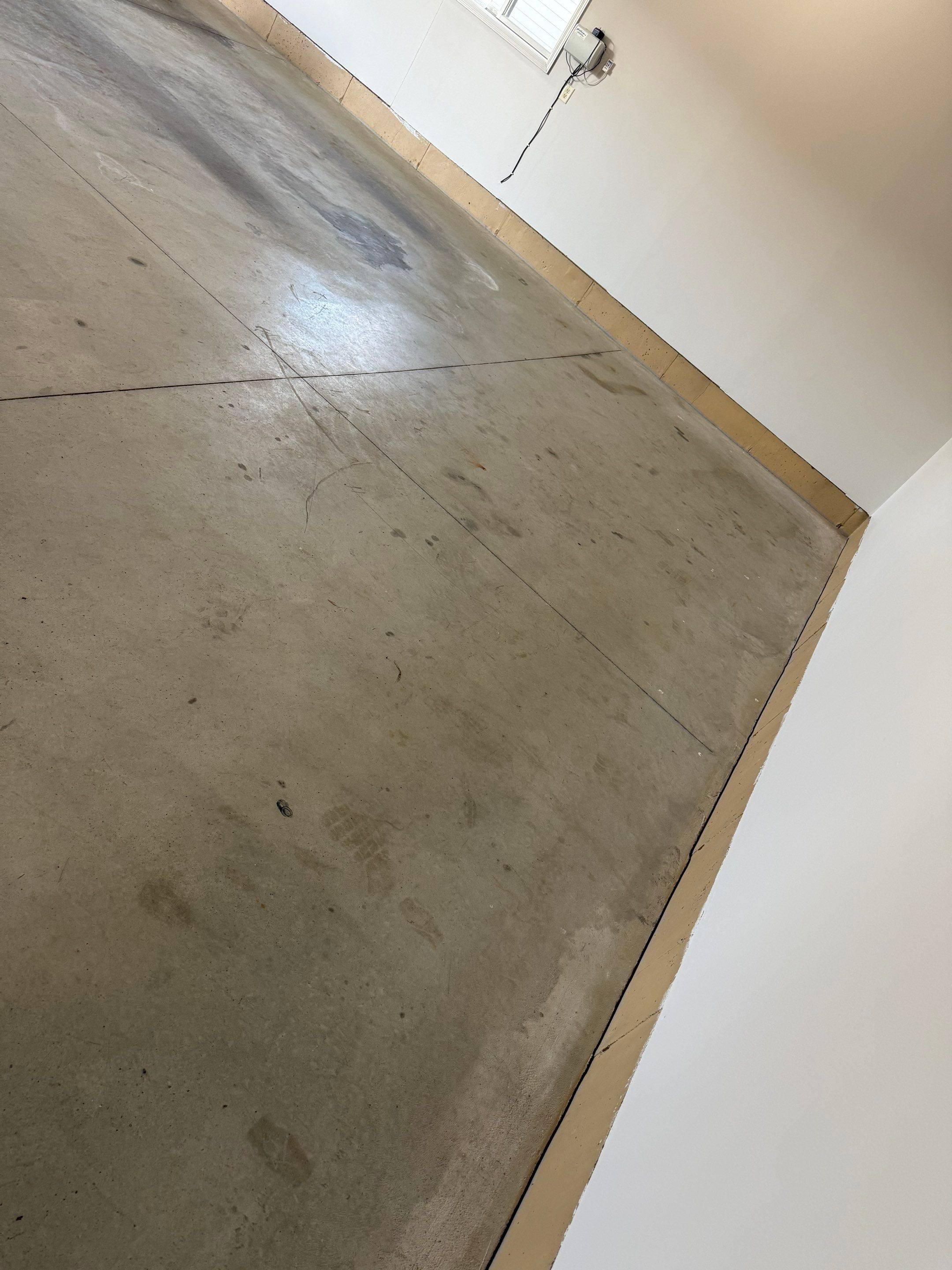 Multi-Car Garage Epoxy Floor Coating in Beresford by Select Painting, Coatings & Garage Cabinets