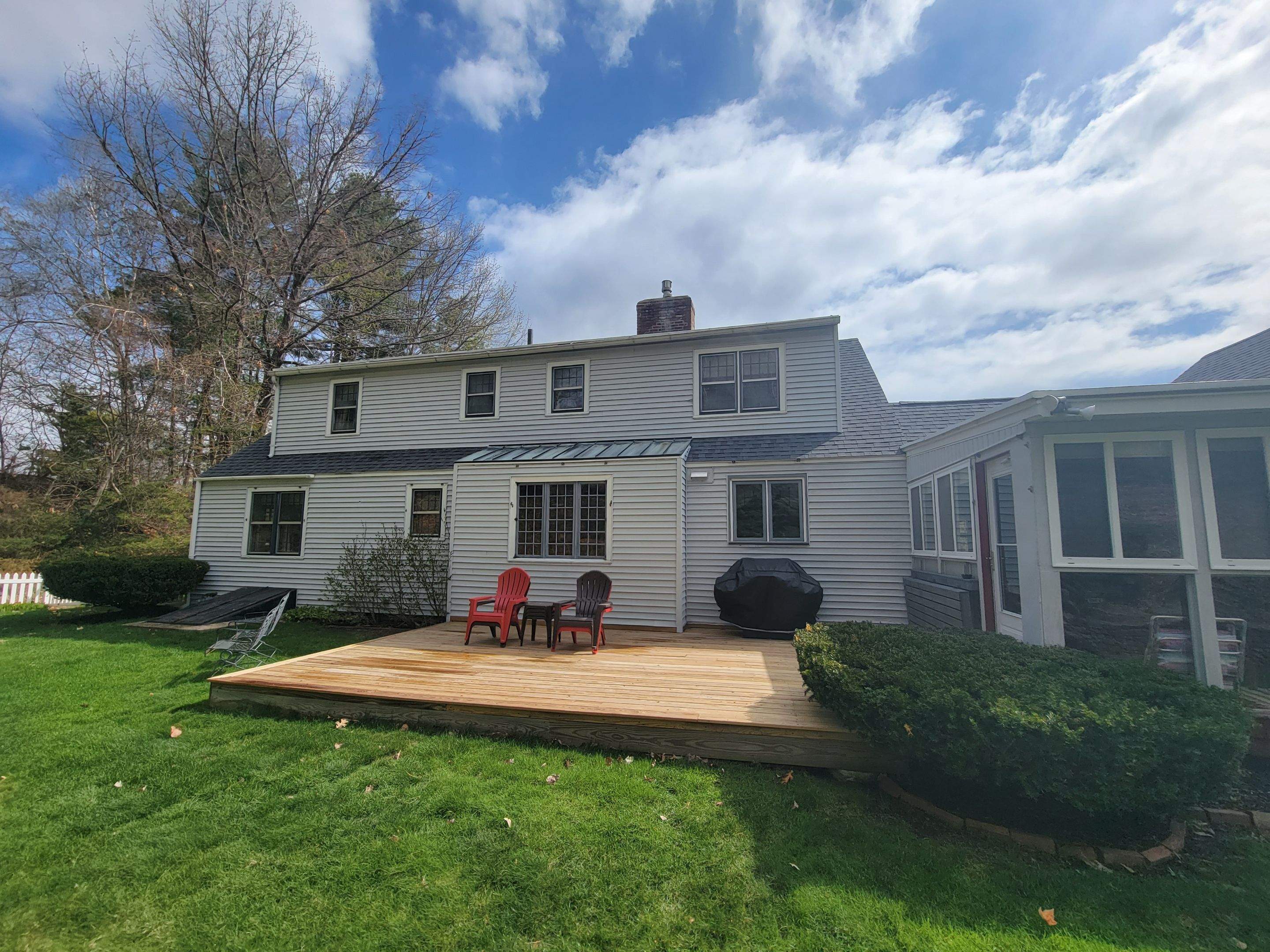 Siding Installation using James Hardie Countrylane red by UBrothers Construction