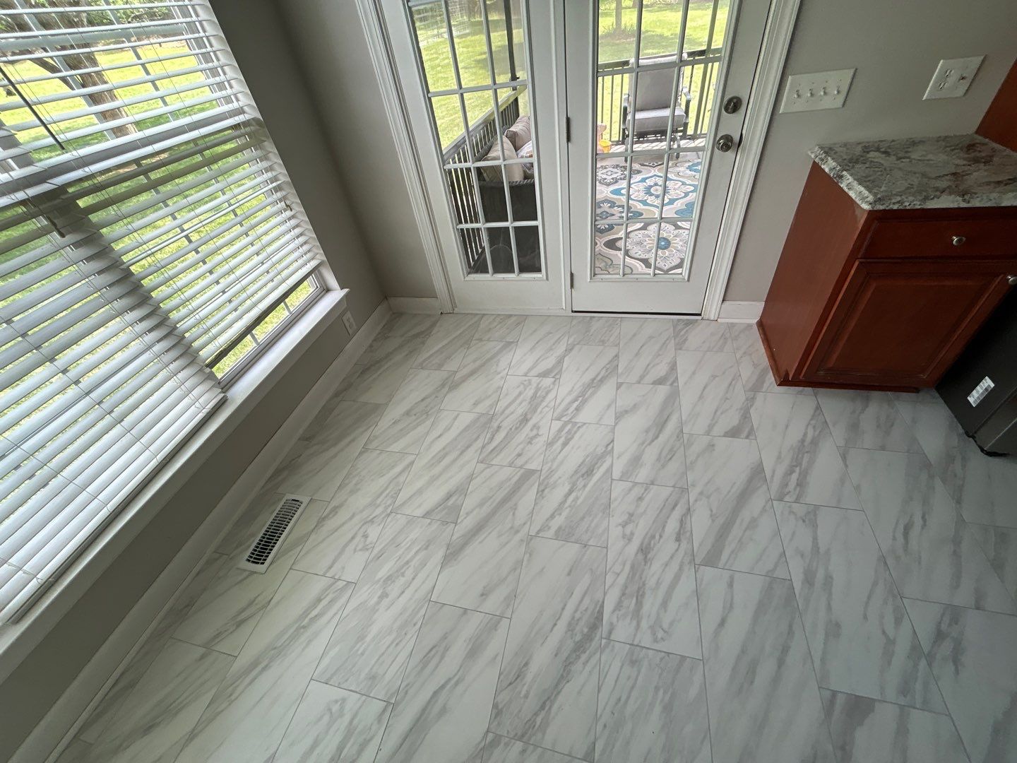 Kitchen floor refresh  by Footprints Floors of Nashville