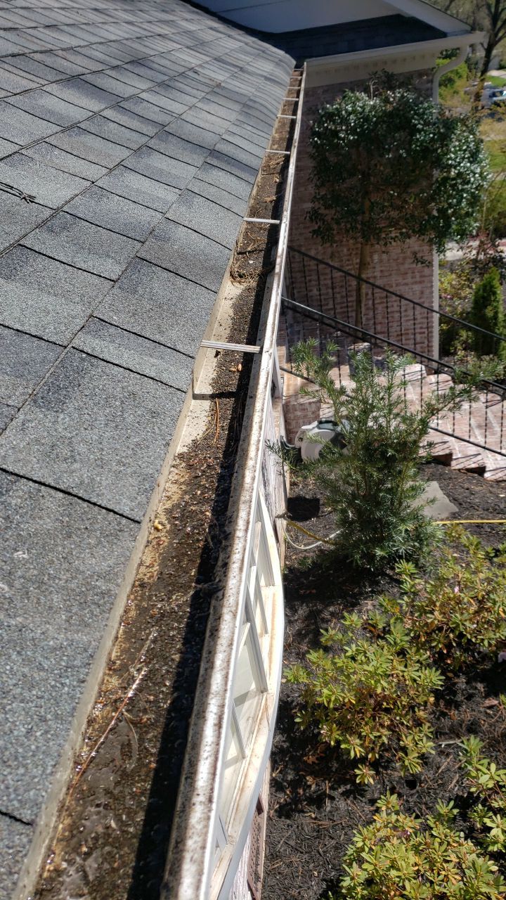 Gutter Cleaning using water by Power Wash Masters LLC